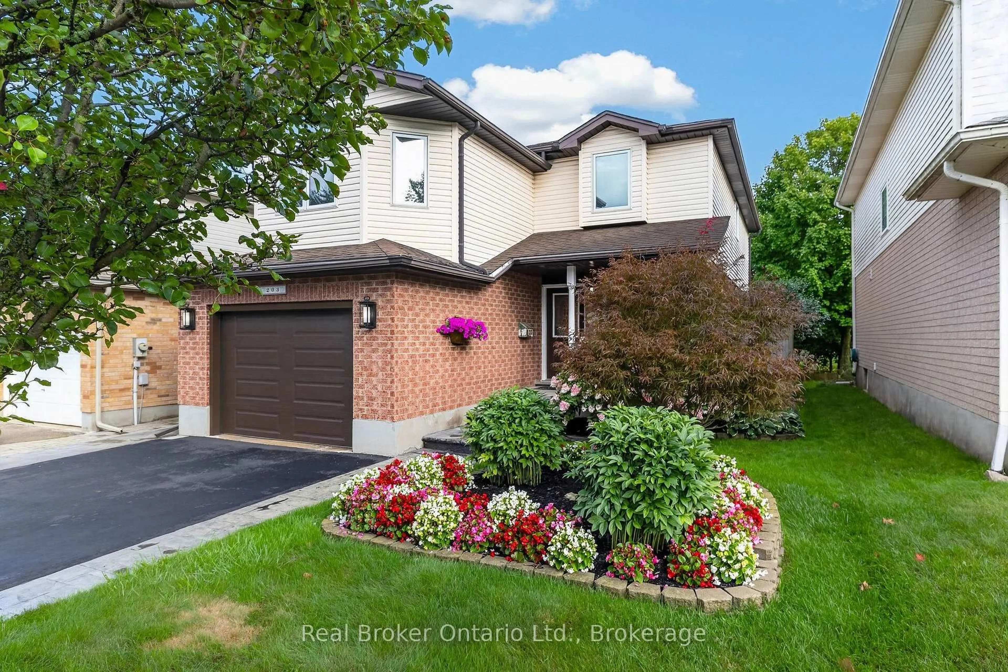 Home with brick exterior material, street for 203 Country Club Dr, Guelph Ontario N1E 3K8