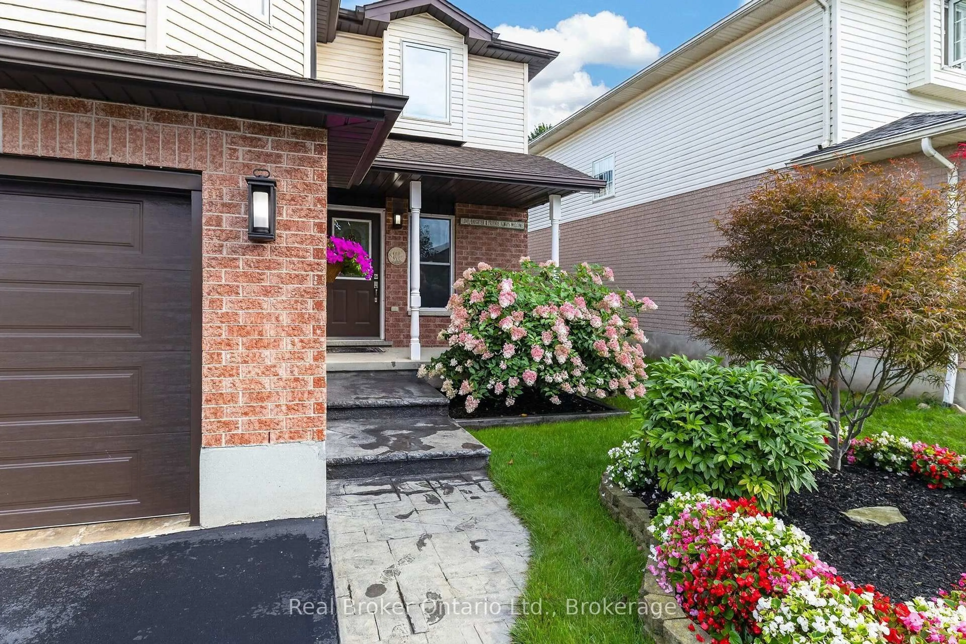 Home with brick exterior material, street for 203 Country Club Dr, Guelph Ontario N1E 3K8