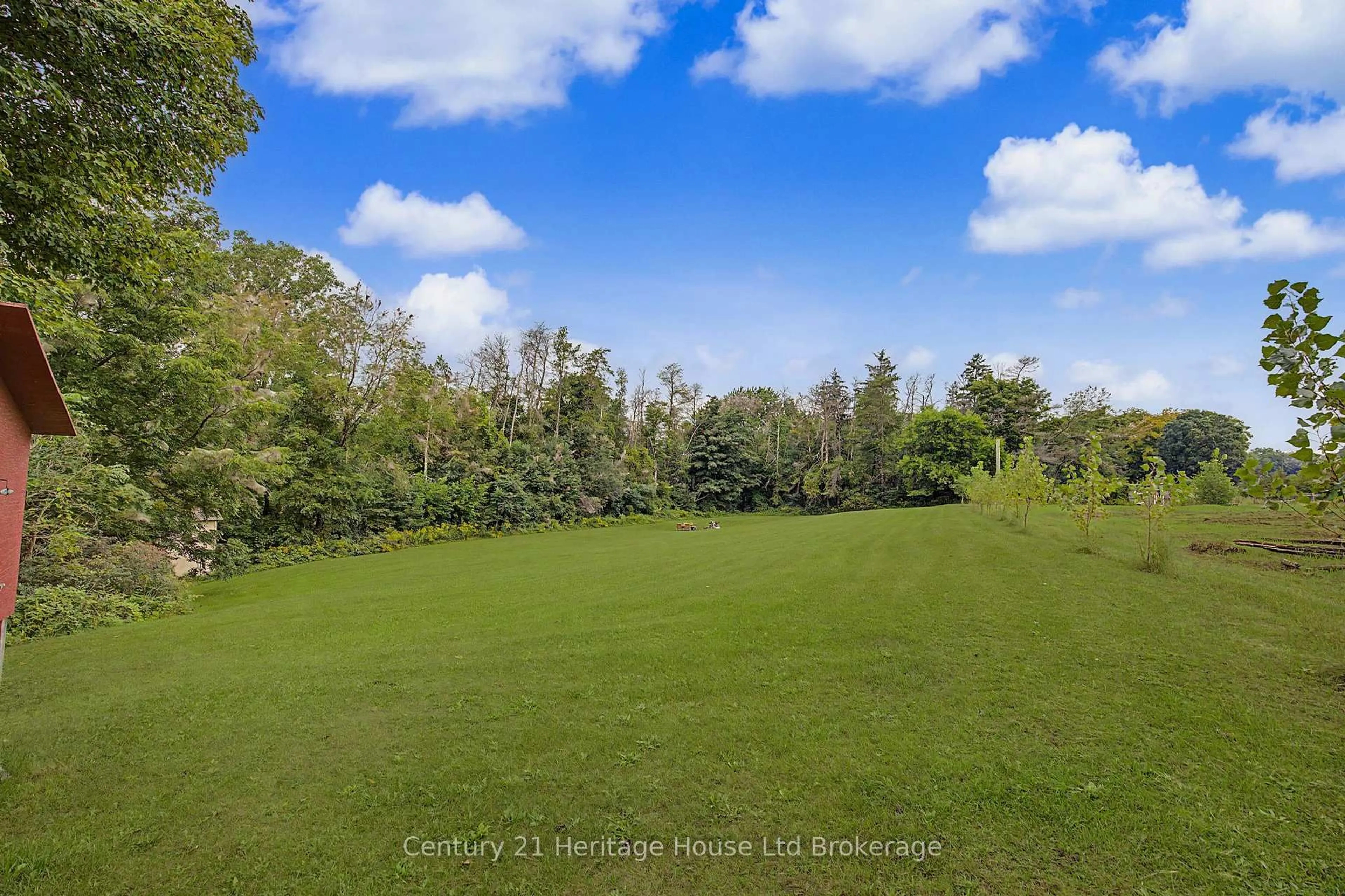 A pic from outside/outdoor area/front of a property/back of a property/a pic from drone, forest/trees view for 185559 Cornell Rd, Norwich Ontario N0J 1R0