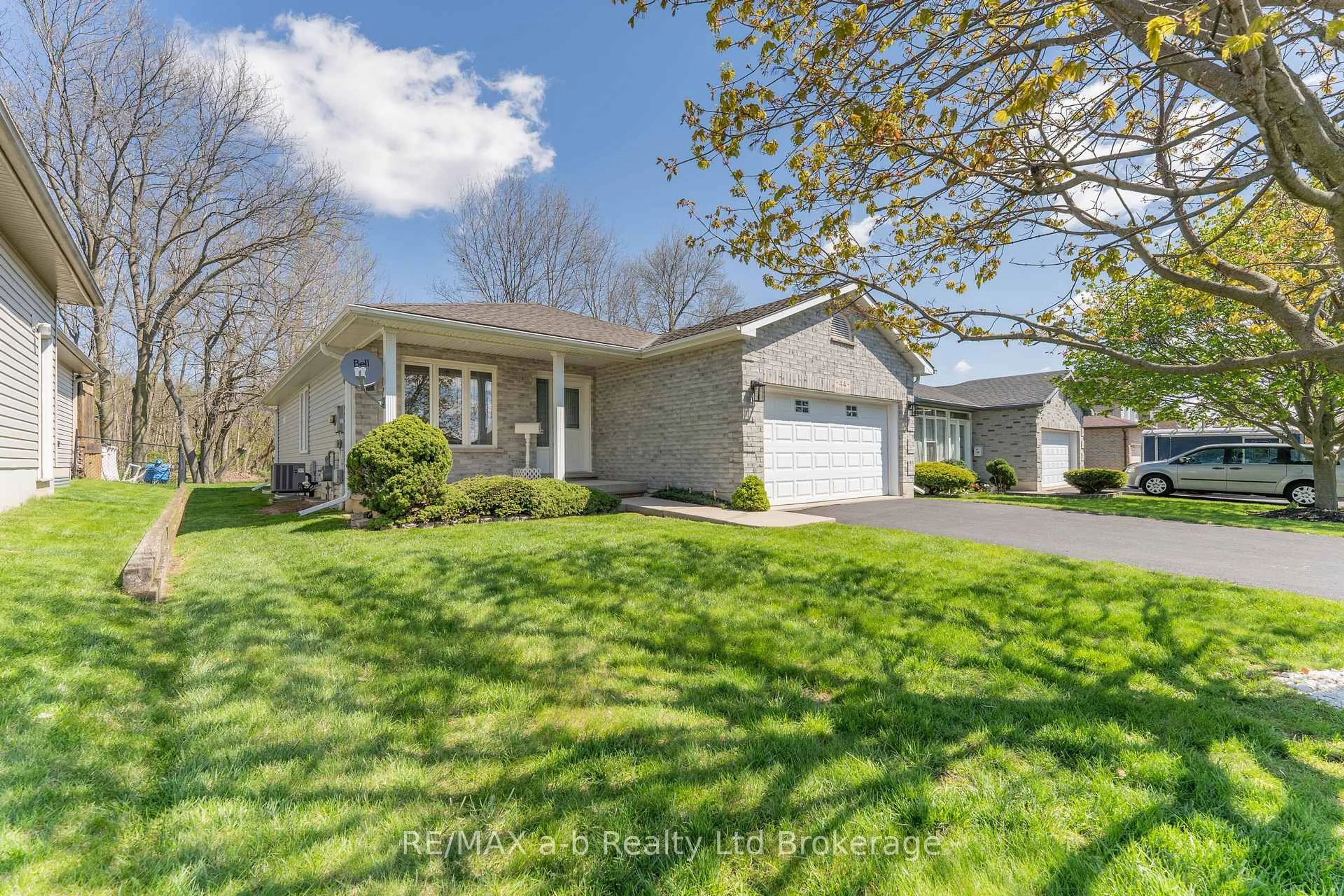 Home with vinyl exterior material, street for 44 Beech Blvd, Tillsonburg Ontario N4G 5R8