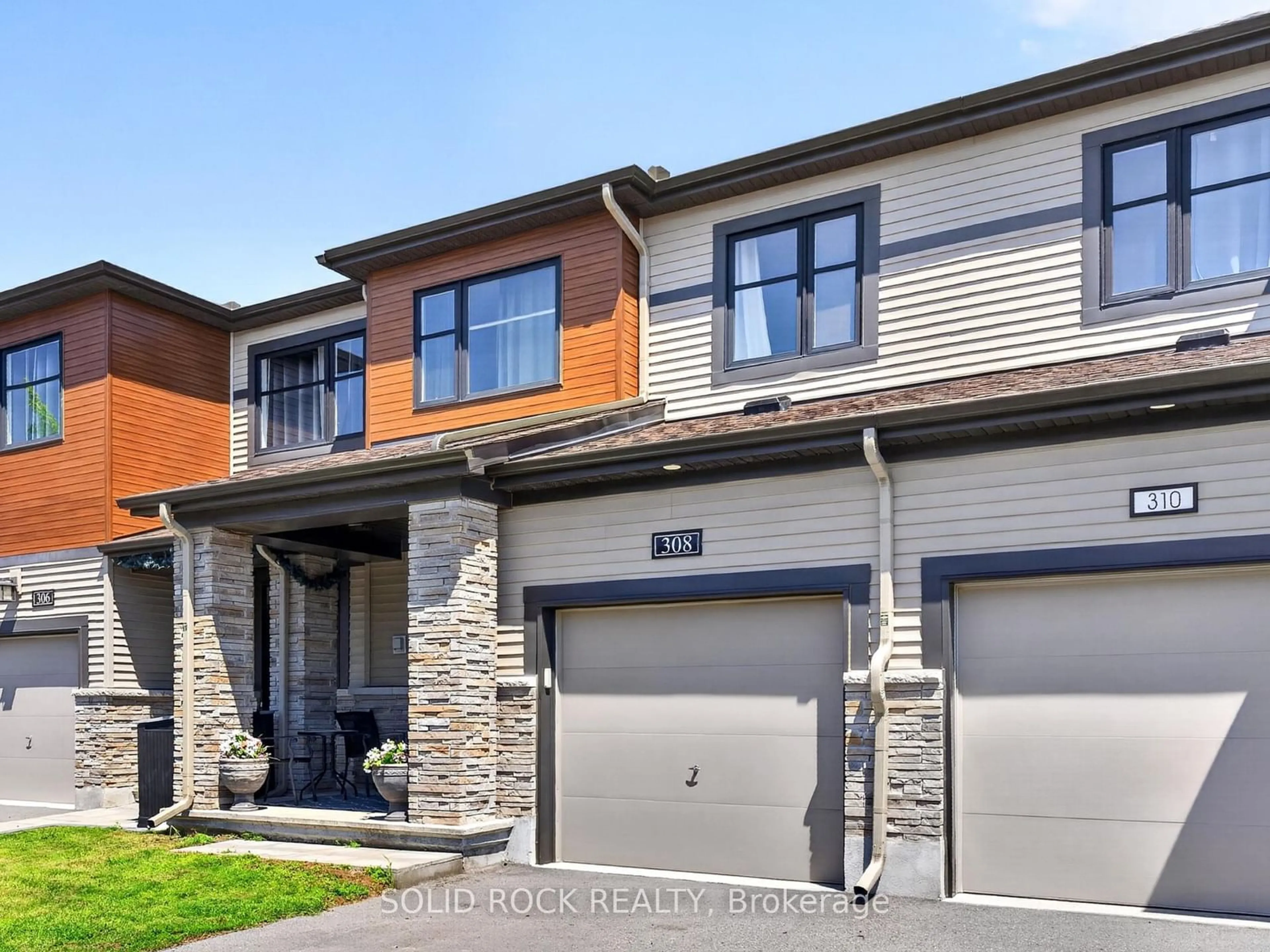 Home with brick exterior material, street for 308 Drumlish Lane, Ottawa Ontario K2J 6Y1