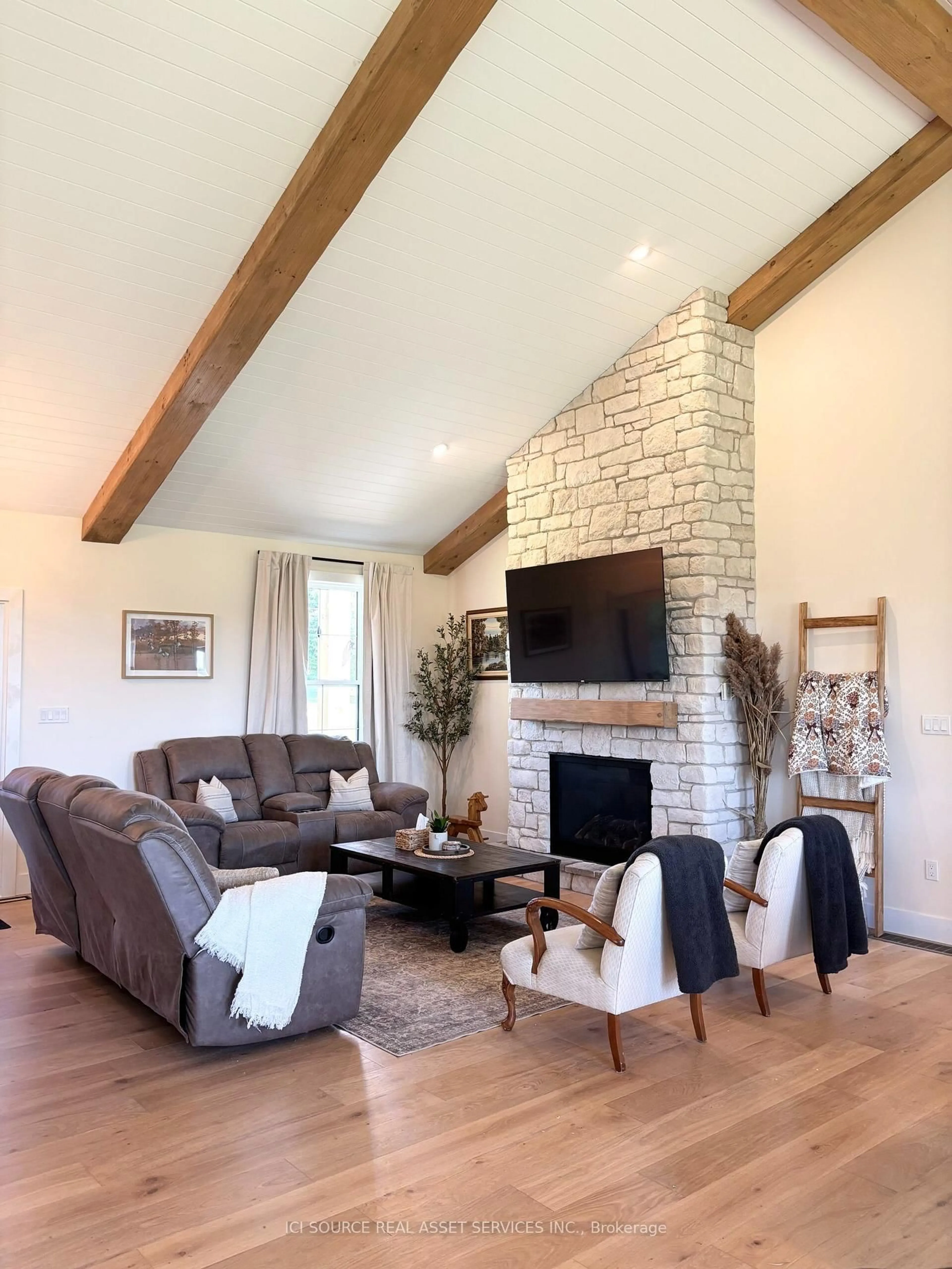 Living room with furniture, wood/laminate floor for 723 Rosedale Rd, Smiths Falls Ontario K7A 4S7