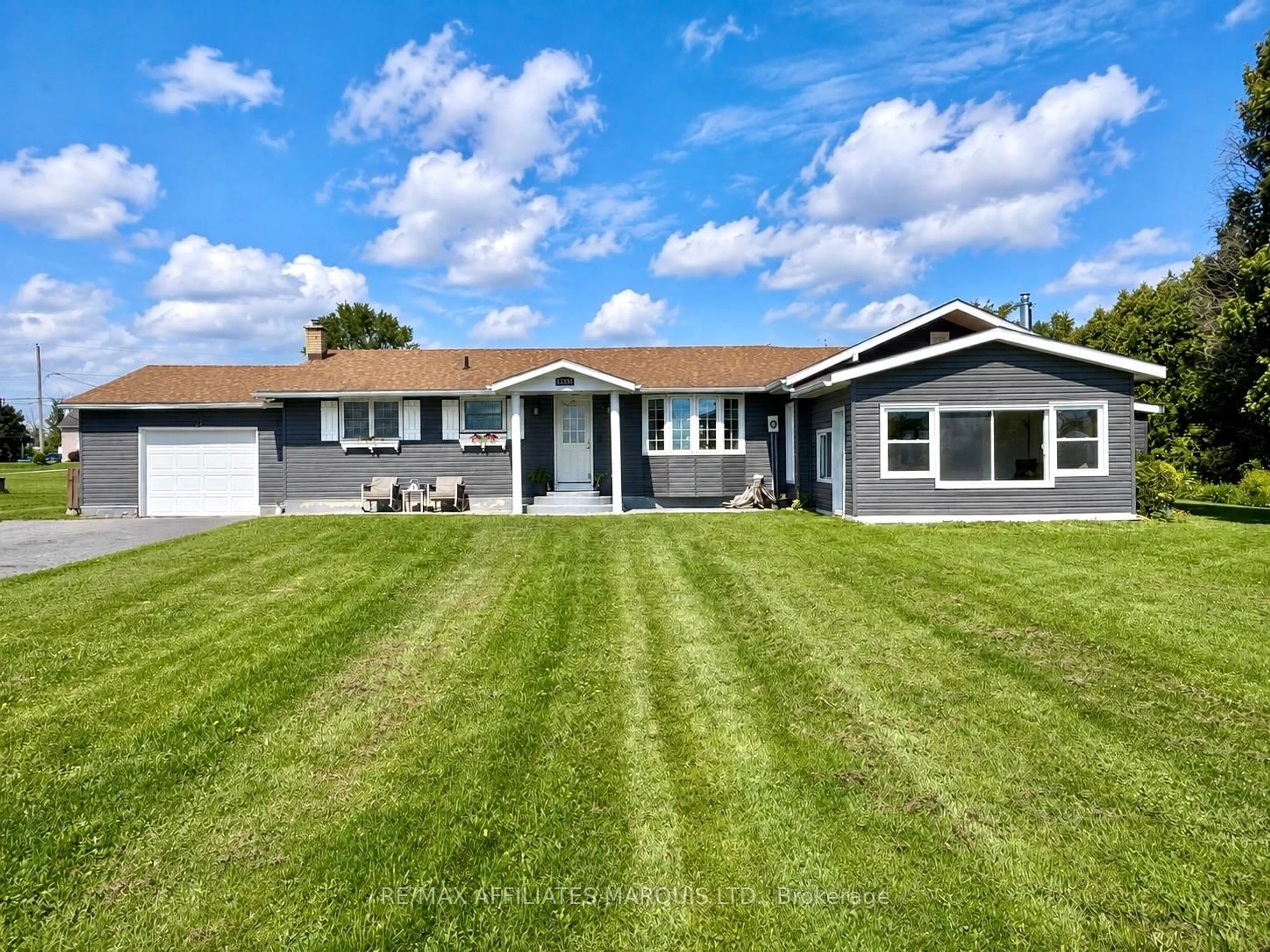 Home with vinyl exterior material, street for 15253 County Road 2 Rd, South Stormont Ontario K0C 1M0