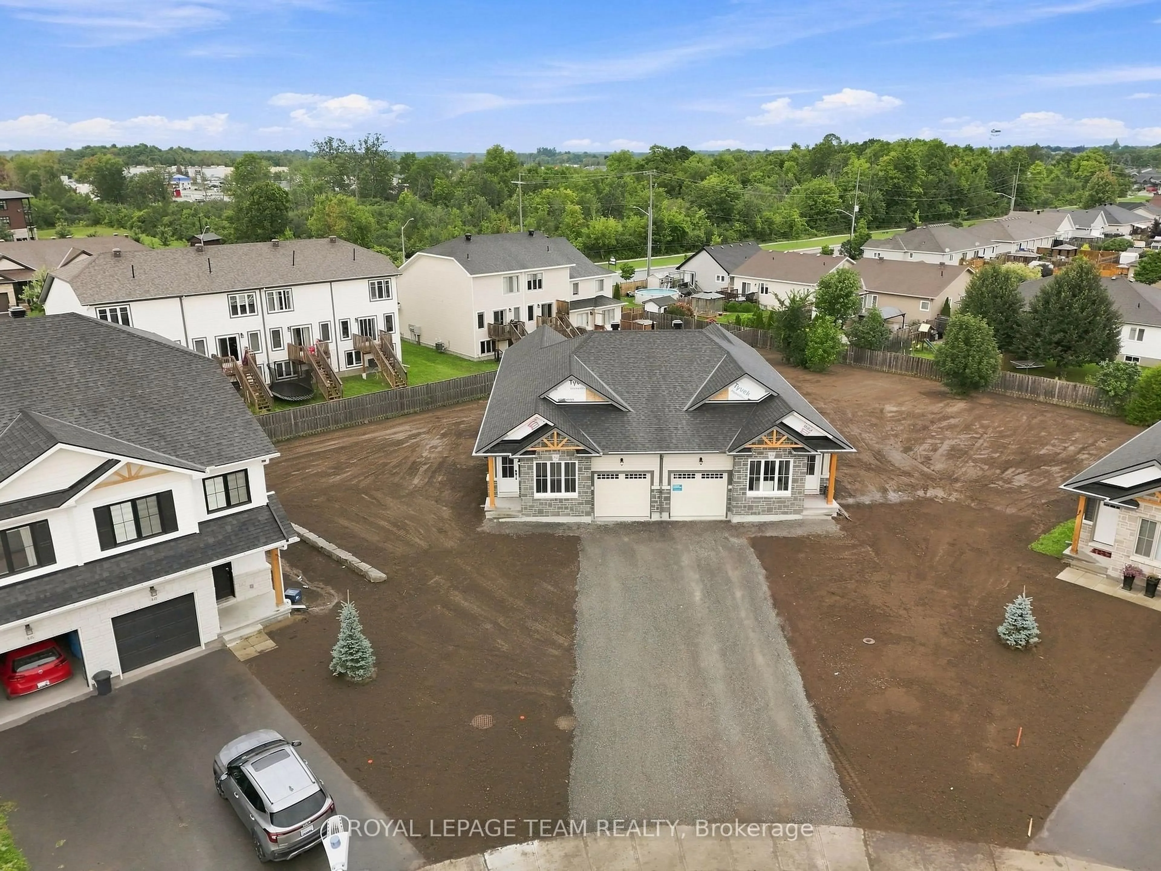 A pic from outside/outdoor area/front of a property/back of a property/a pic from drone, unknown for 52 Whitcomb Cres, Smiths Falls Ontario K7A 0C2