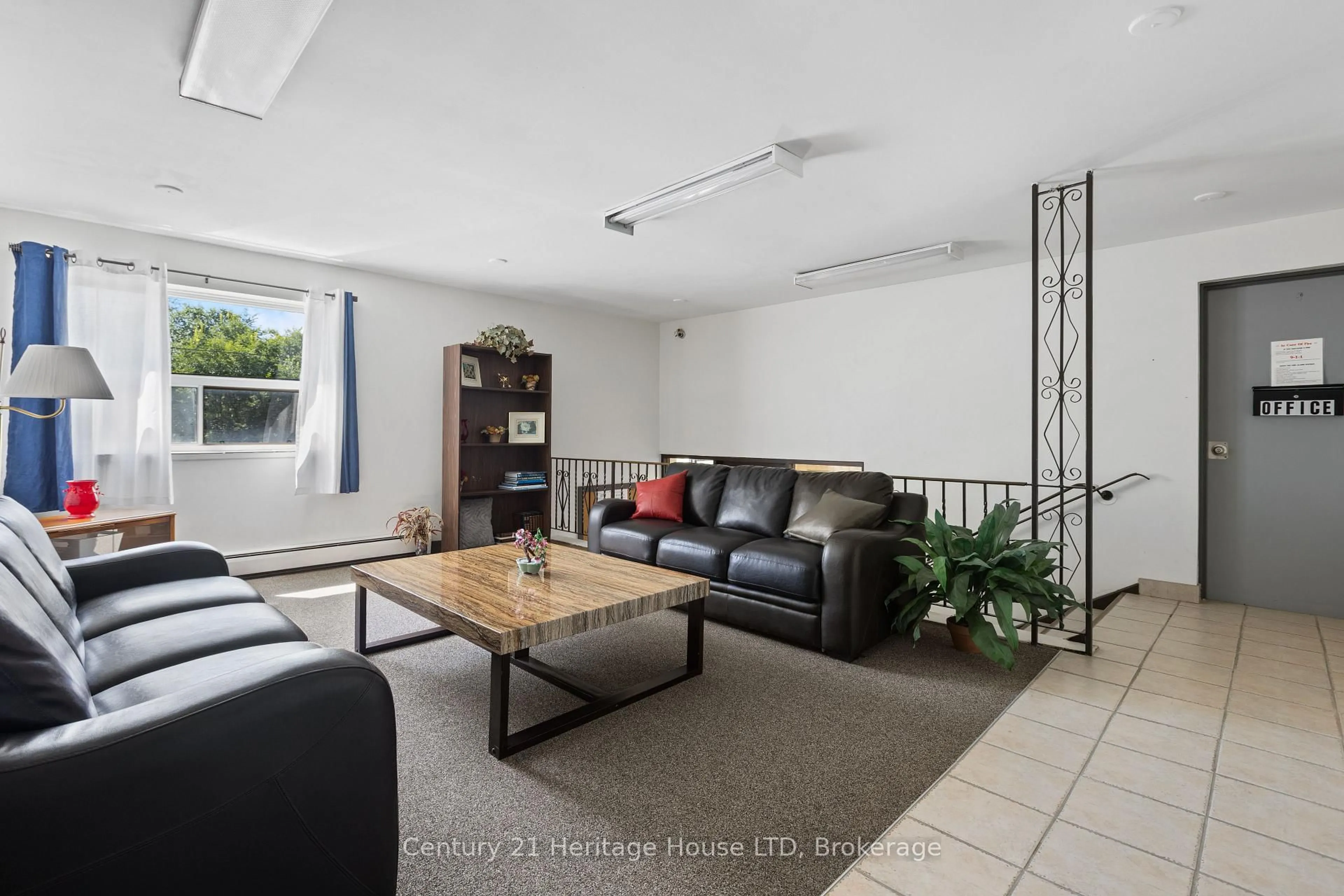 Living room with furniture, unknown for 242 Oakdale Ave #109, St. Catharines Ontario L2P 3K5
