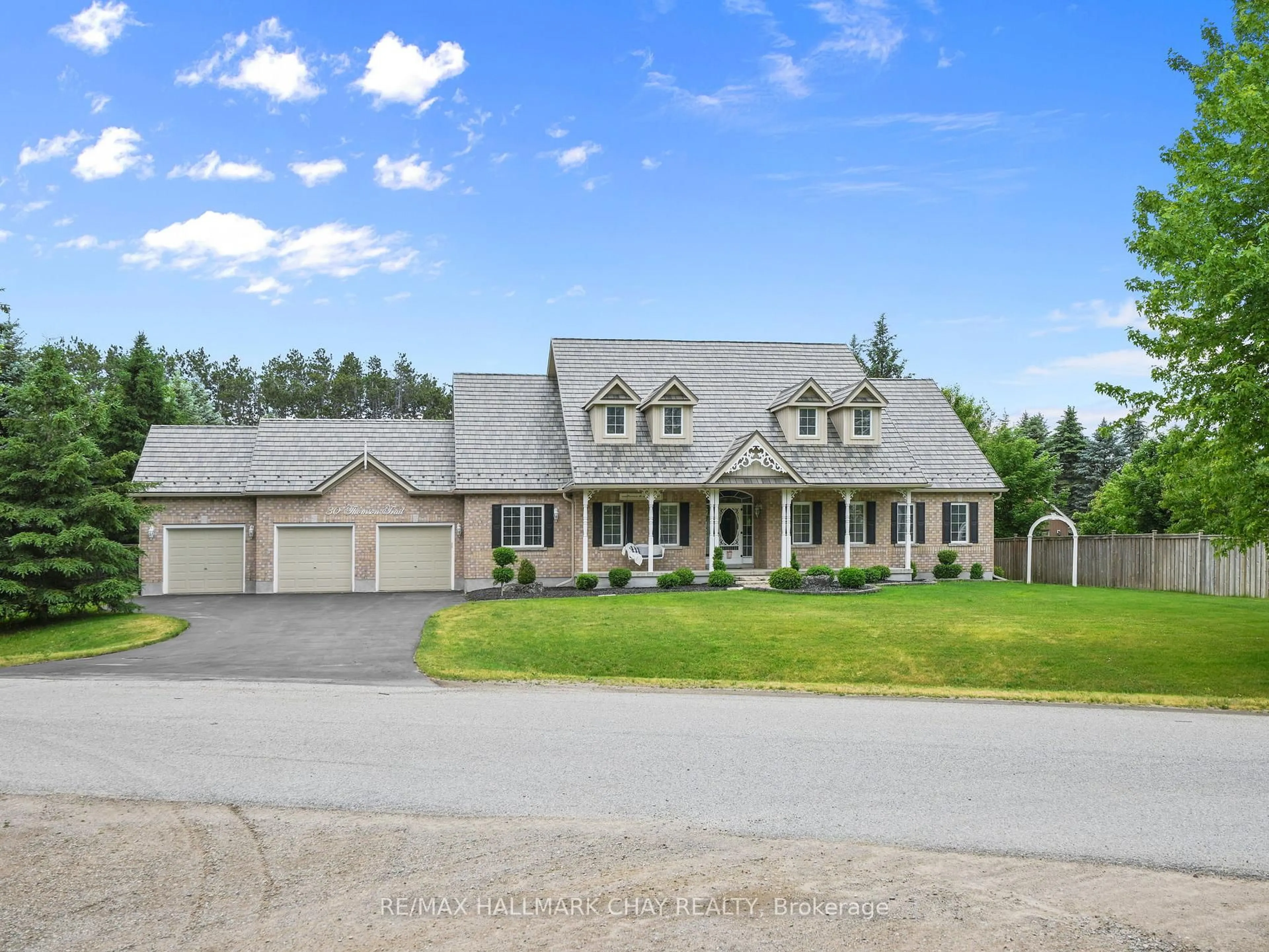 A pic from outside/outdoor area/front of a property/back of a property/a pic from drone, street for 30 Thomson Tr, Mulmur Ontario L0N 1M0