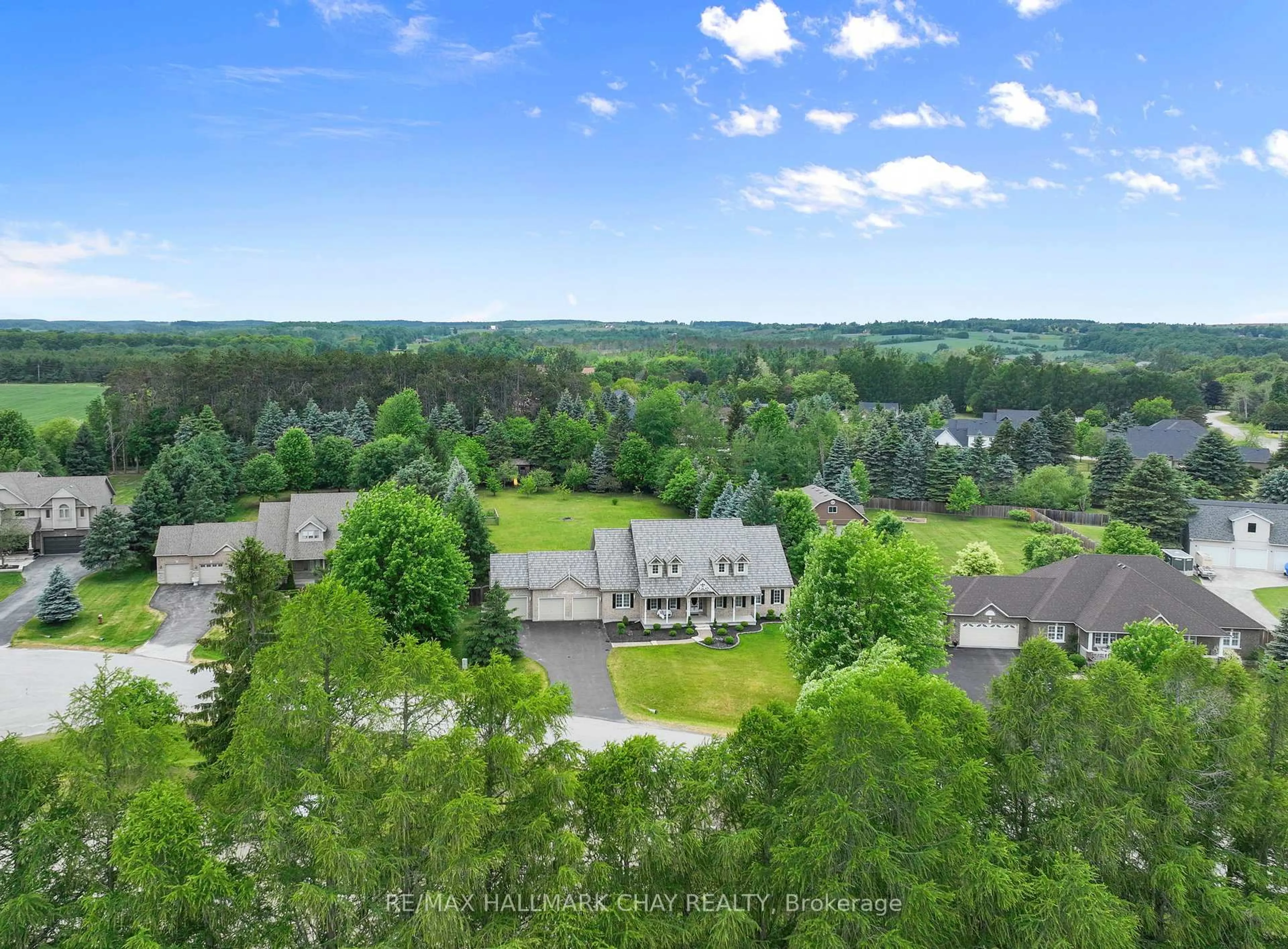 A pic from outside/outdoor area/front of a property/back of a property/a pic from drone, unknown for 30 Thomson Tr, Mulmur Ontario L0N 1M0