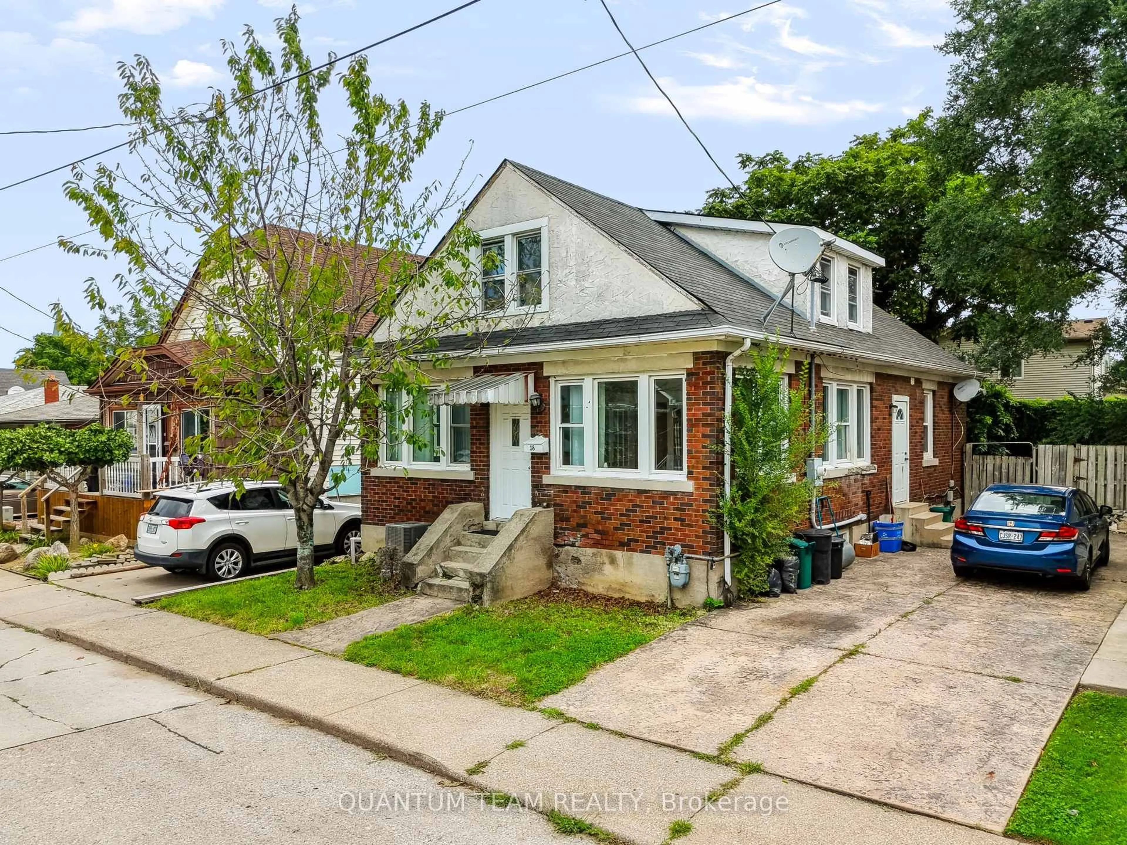 Home with brick exterior material, street for 18 Ormonde Ave, St. Catharines Ontario L2M 5P2