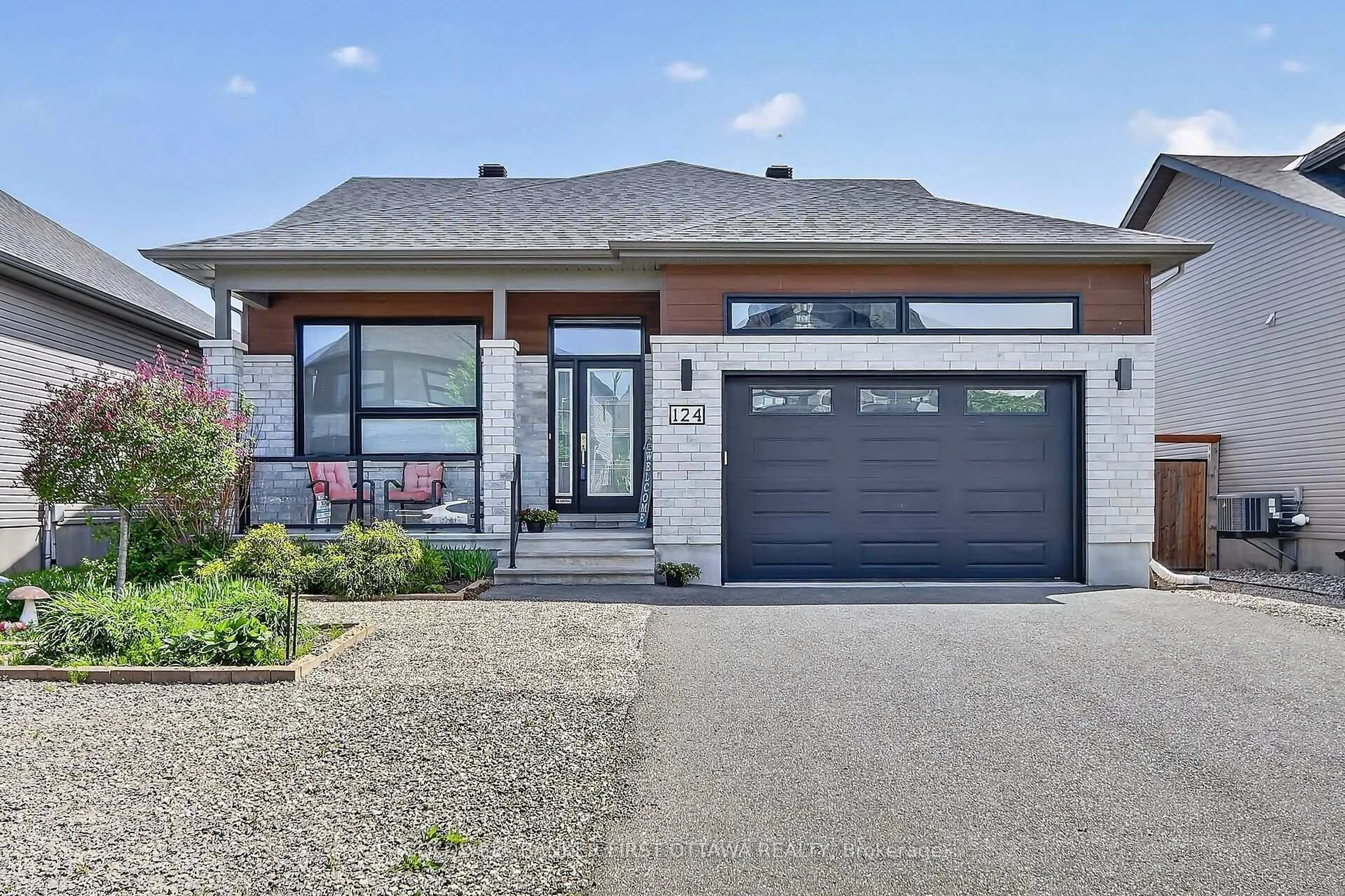 Home with brick exterior material, street for 124 Lyon St, Russell Ontario K0A 1W0