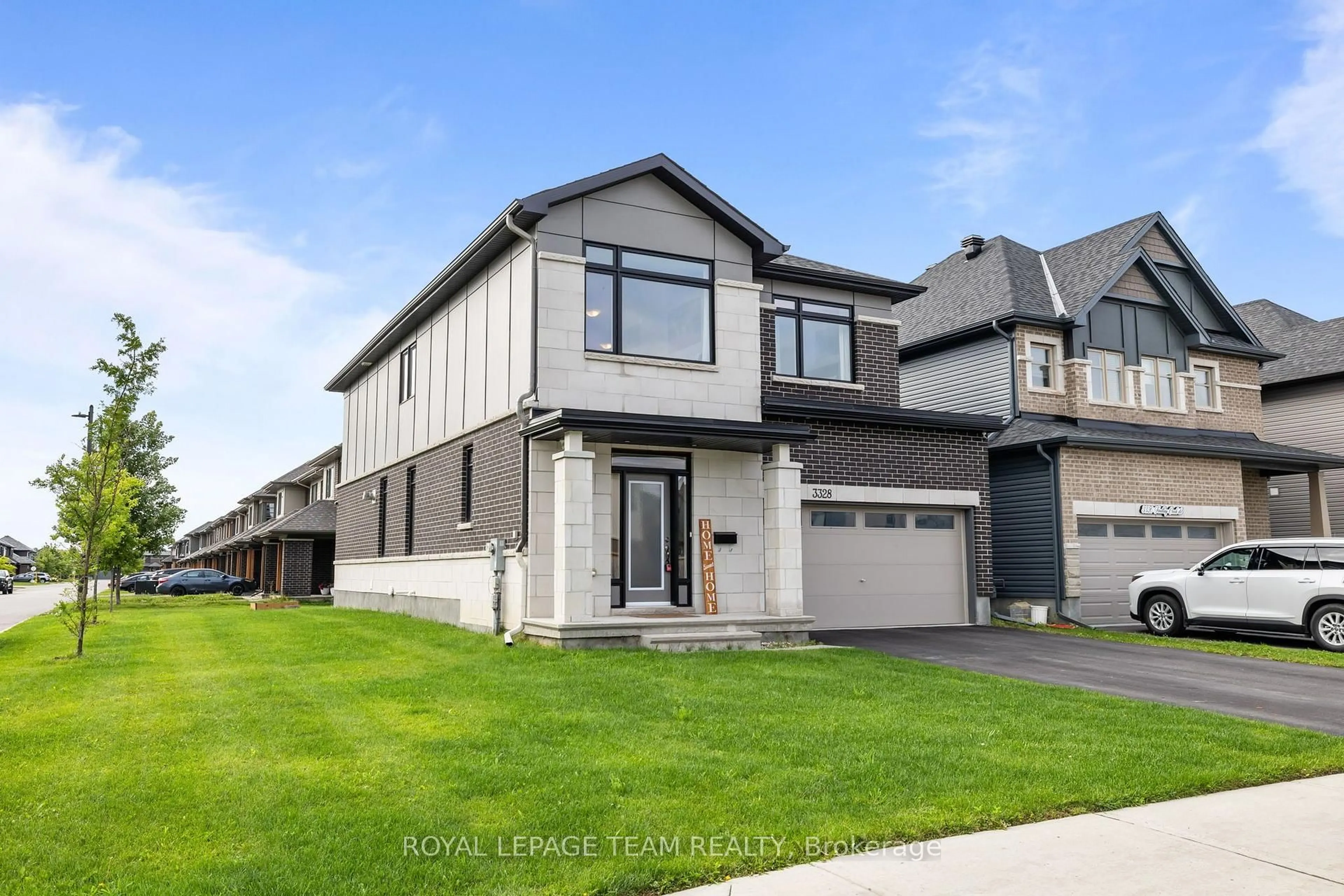 Home with vinyl exterior material, street for 3328 Findlay Creek Dr, Ottawa Ontario K1T 0V2