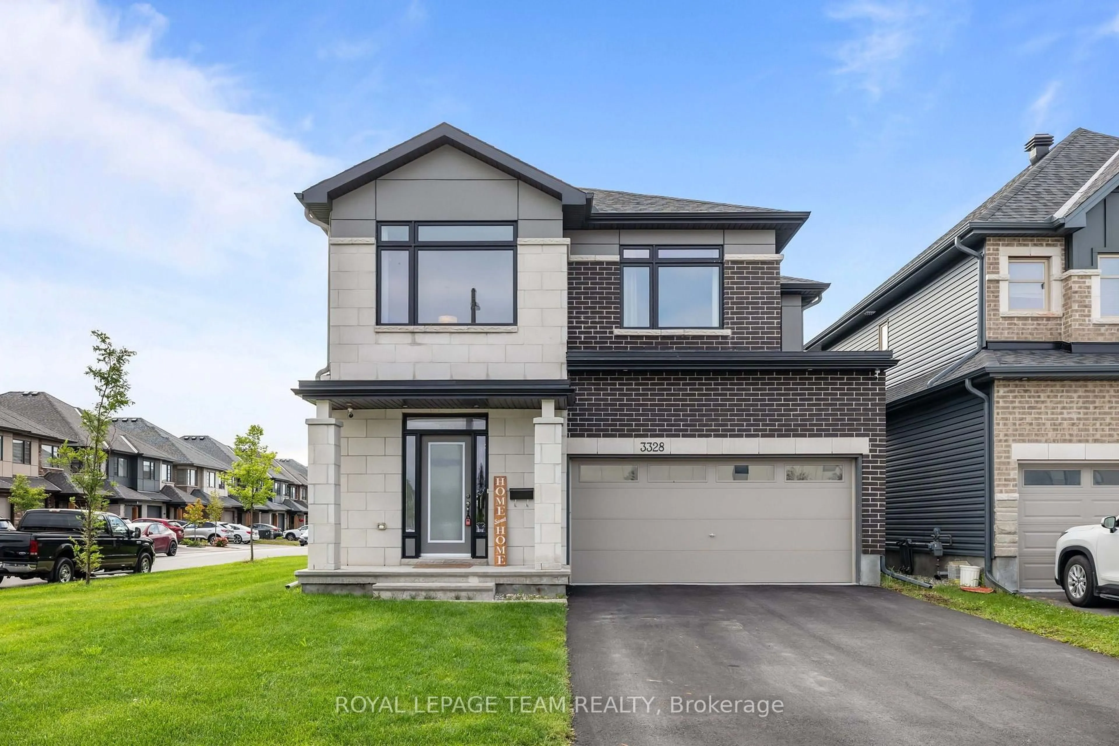 Home with brick exterior material, street for 3328 Findlay Creek Dr, Ottawa Ontario K1T 0V2