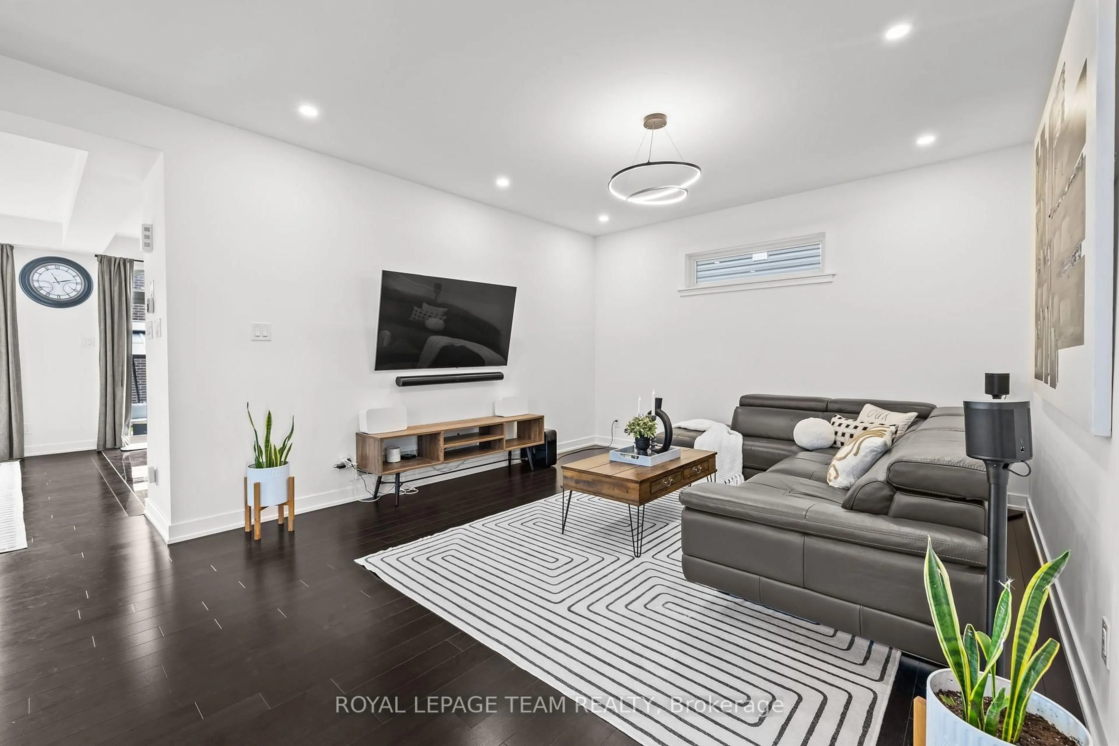 Living room with furniture, unknown for 3328 Findlay Creek Dr, Ottawa Ontario K1T 0V2