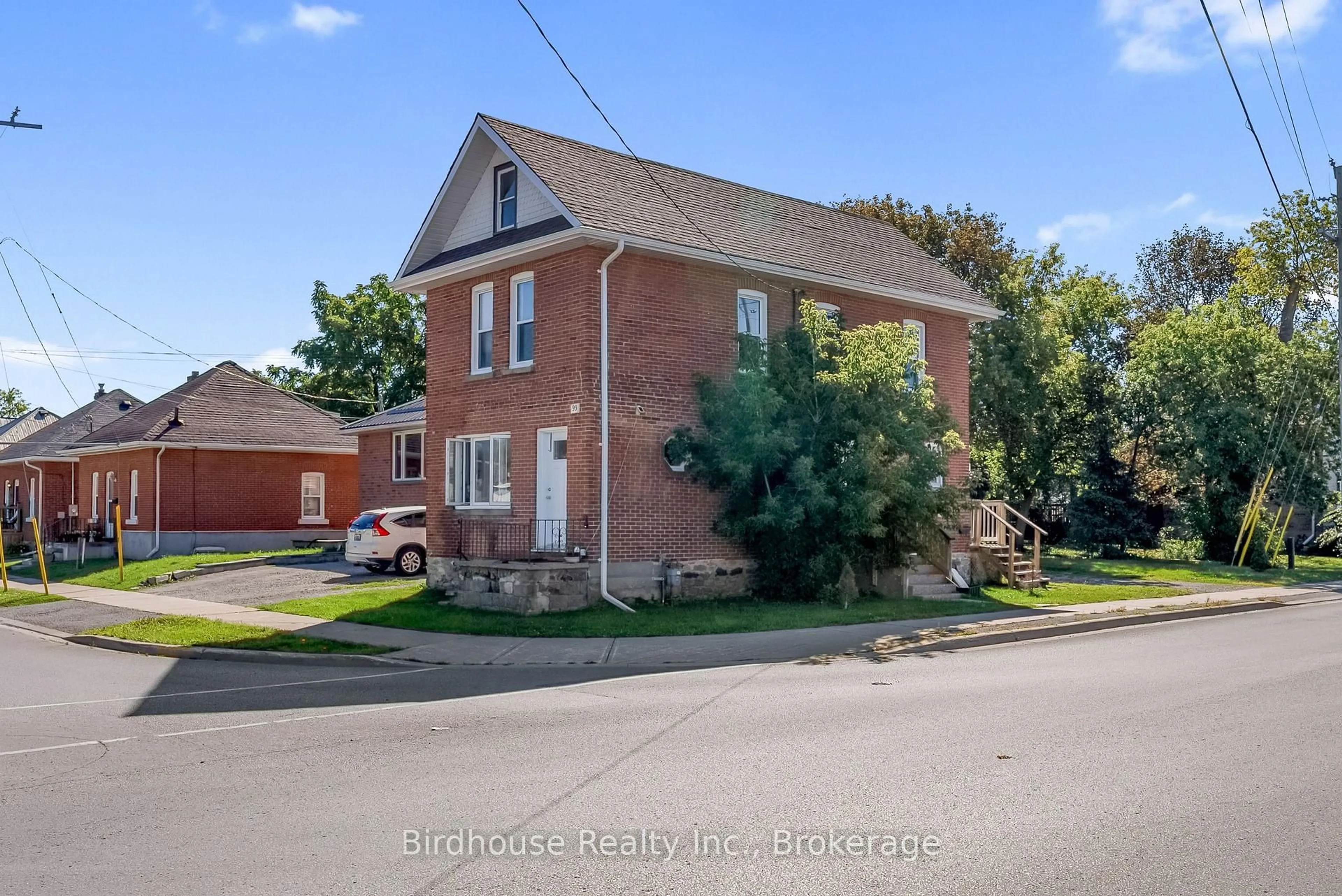 Home with brick exterior material, street for 99 Durham St, Kawartha Lakes Ontario K9V 2P8