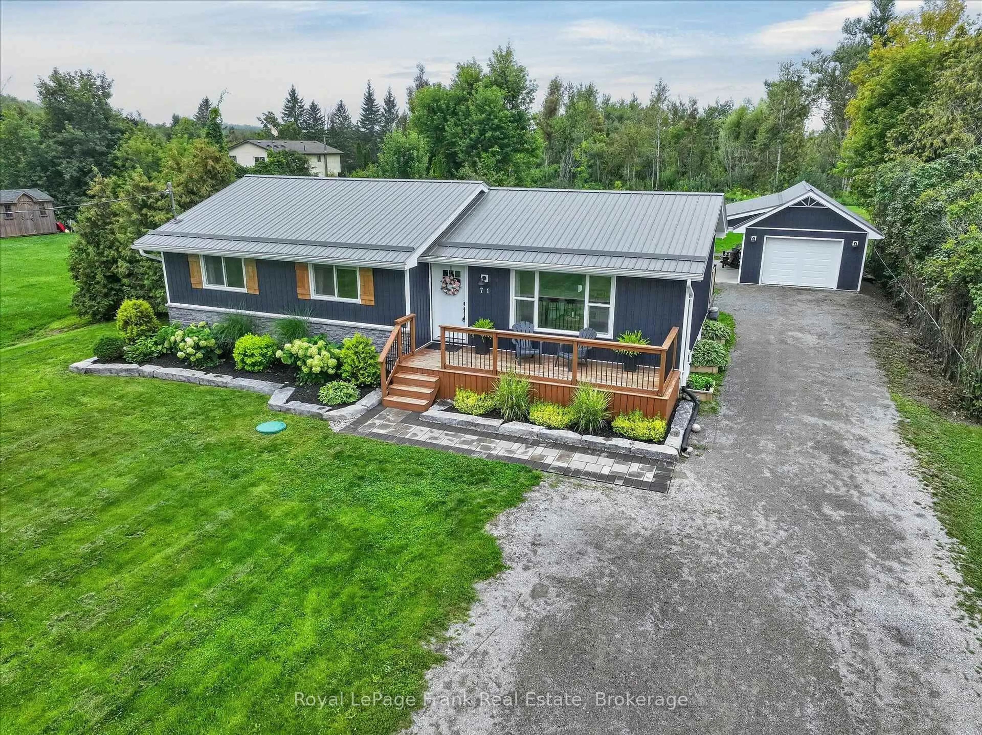 A pic from outside/outdoor area/front of a property/back of a property/a pic from drone, unknown for 71 Queen St, Kawartha Lakes Ontario K0L 2W0