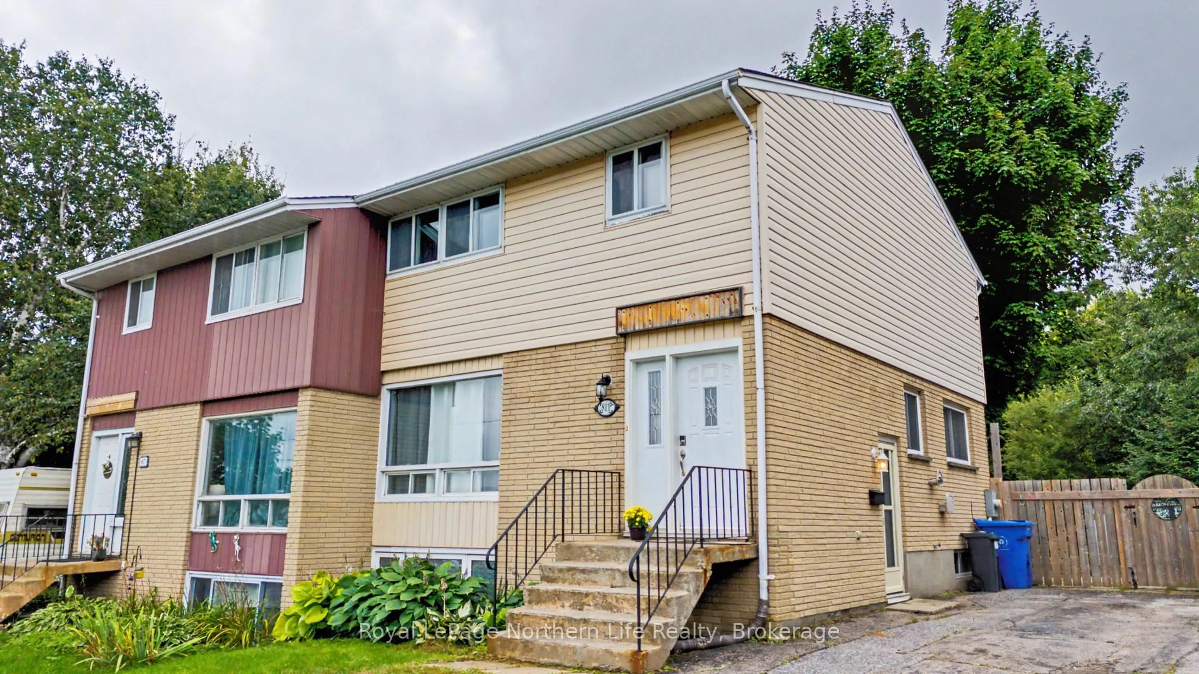 Home with vinyl exterior material, street for 811 Tackaberry Dr, North Bay Ontario P1B 4R8