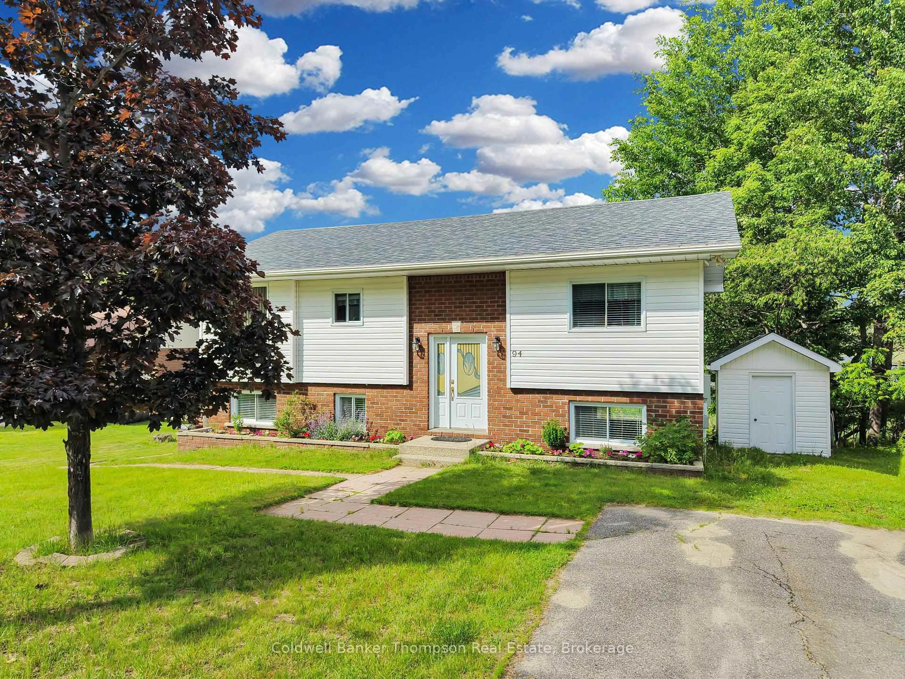 Home with vinyl exterior material, street for 94 Brunel Rd, Huntsville Ontario P1H 1R1