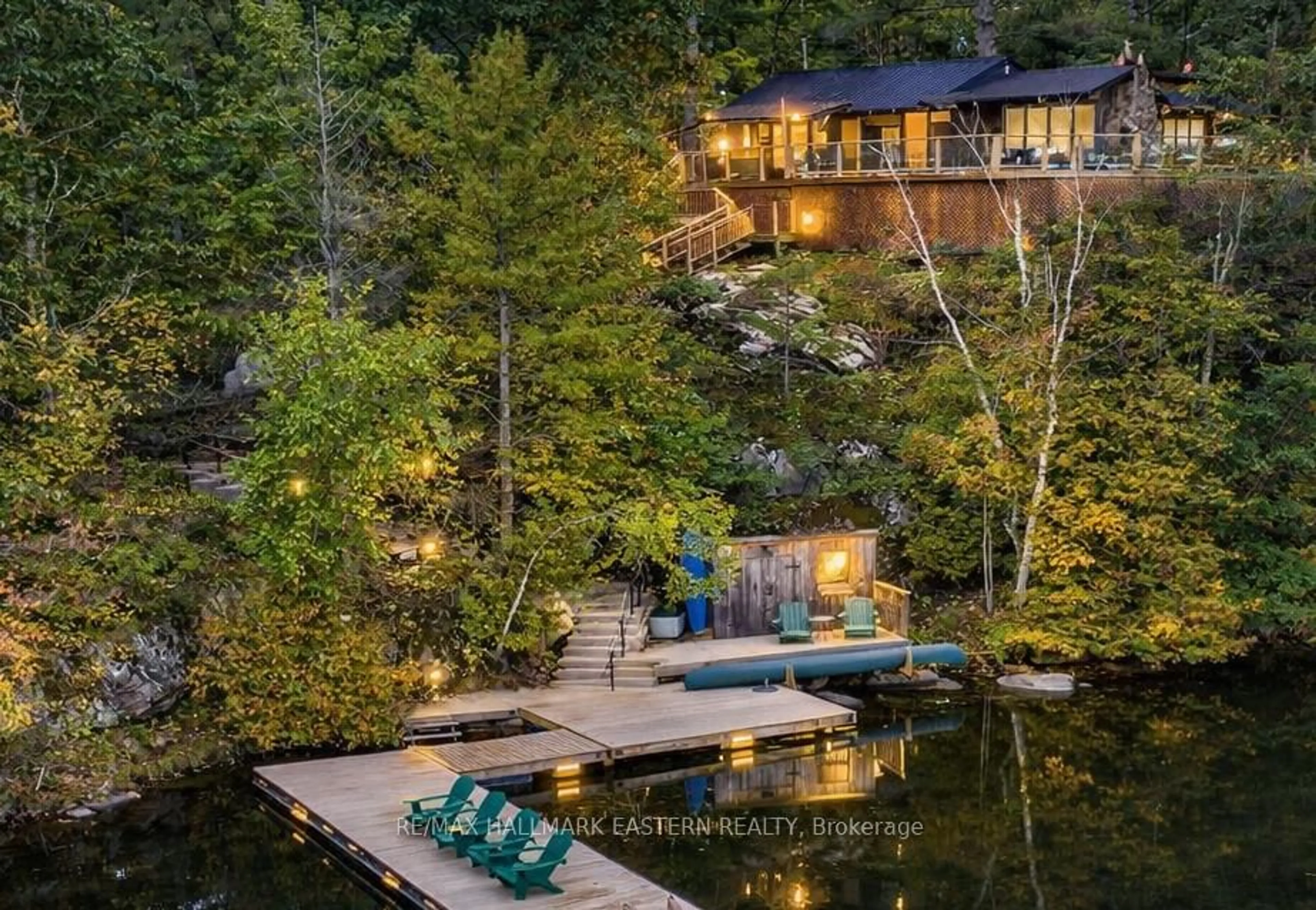 A pic from outside/outdoor area/front of a property/back of a property/a pic from drone, water/lake/river/ocean view for 2712 Channel View Lane, Selwyn Ontario K0L 2H0