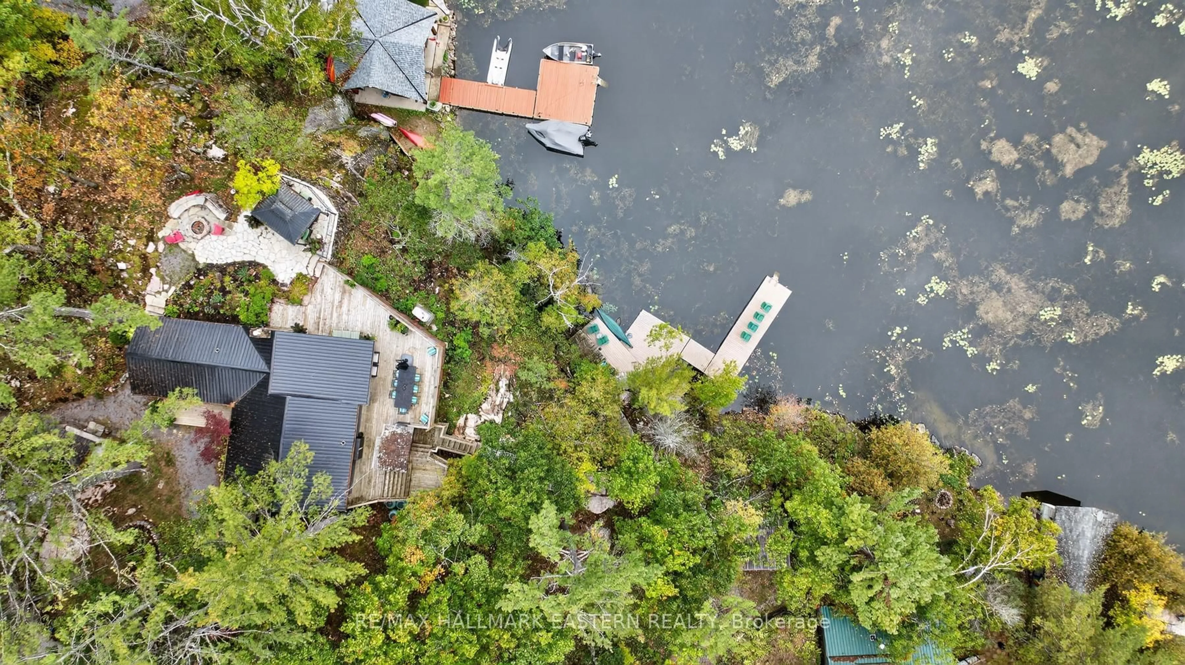 A pic from outside/outdoor area/front of a property/back of a property/a pic from drone, water/lake/river/ocean view for 2712 Channel View Lane, Selwyn Ontario K0L 2H0