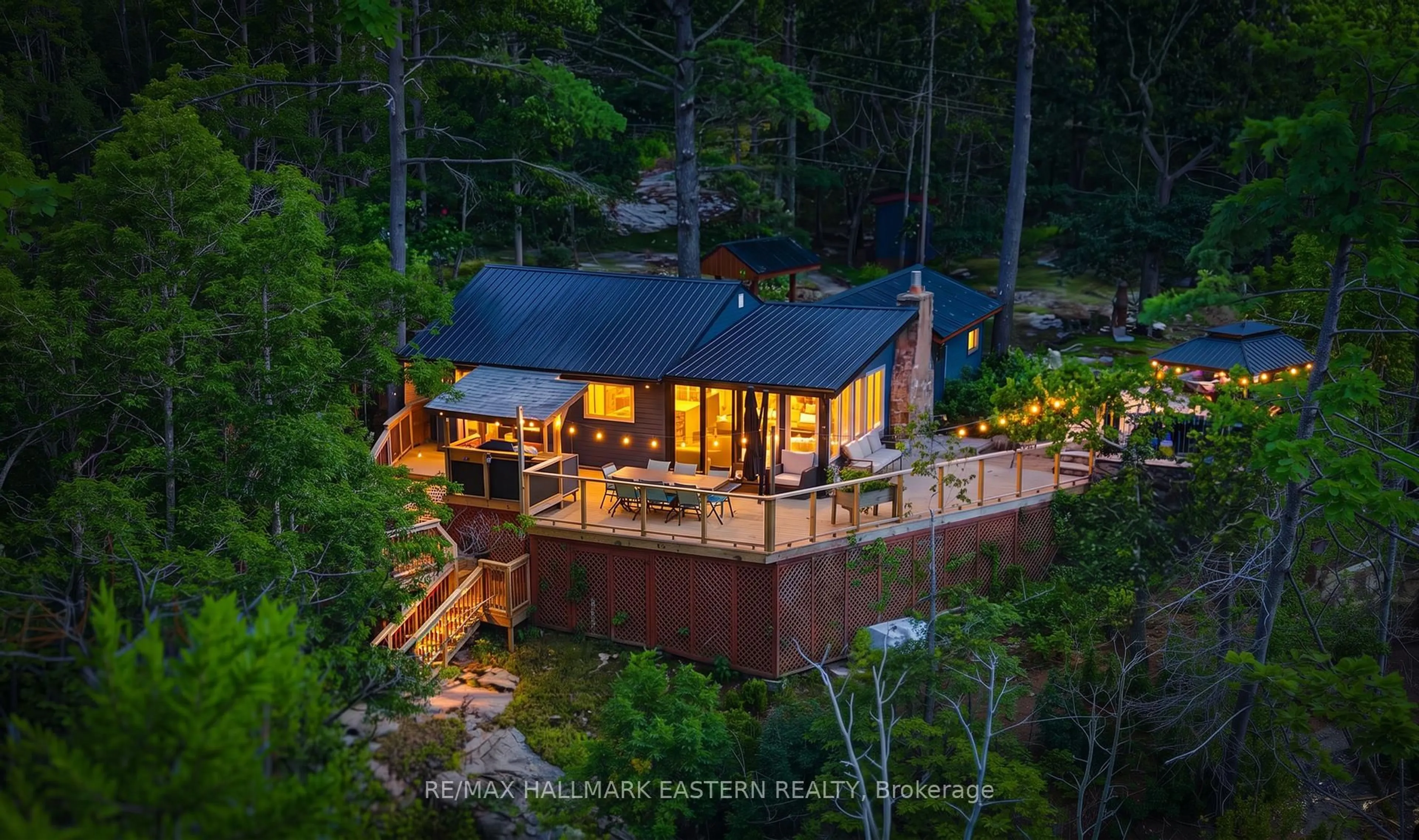 A pic from outside/outdoor area/front of a property/back of a property/a pic from drone, water/lake/river/ocean view for 2712 Channel View Lane, Selwyn Ontario K0L 2H0