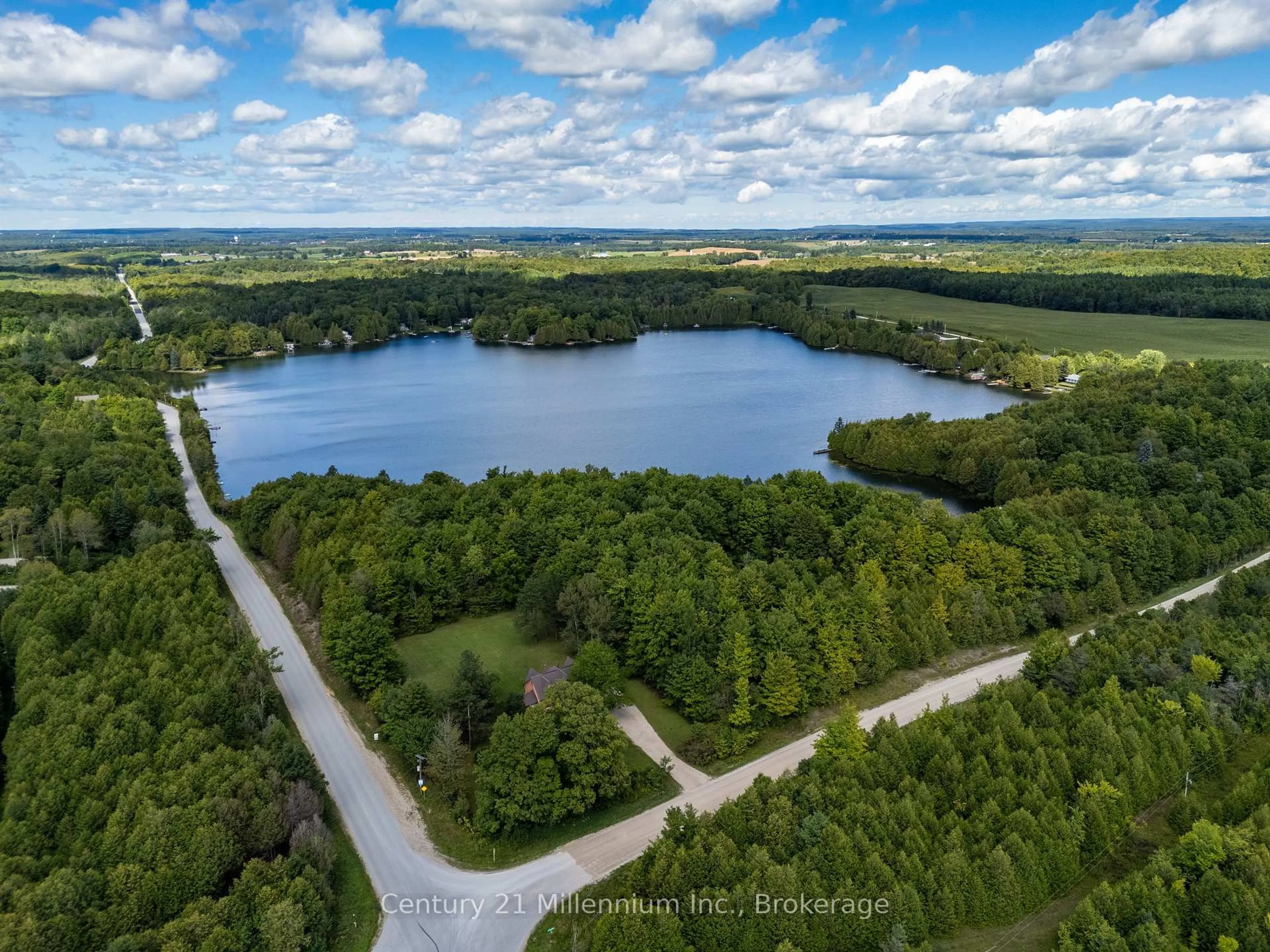 A pic from outside/outdoor area/front of a property/back of a property/a pic from drone, water/lake/river/ocean view for 425005 Irish Lake Rd, Grey Highlands Ontario N0C 1H0