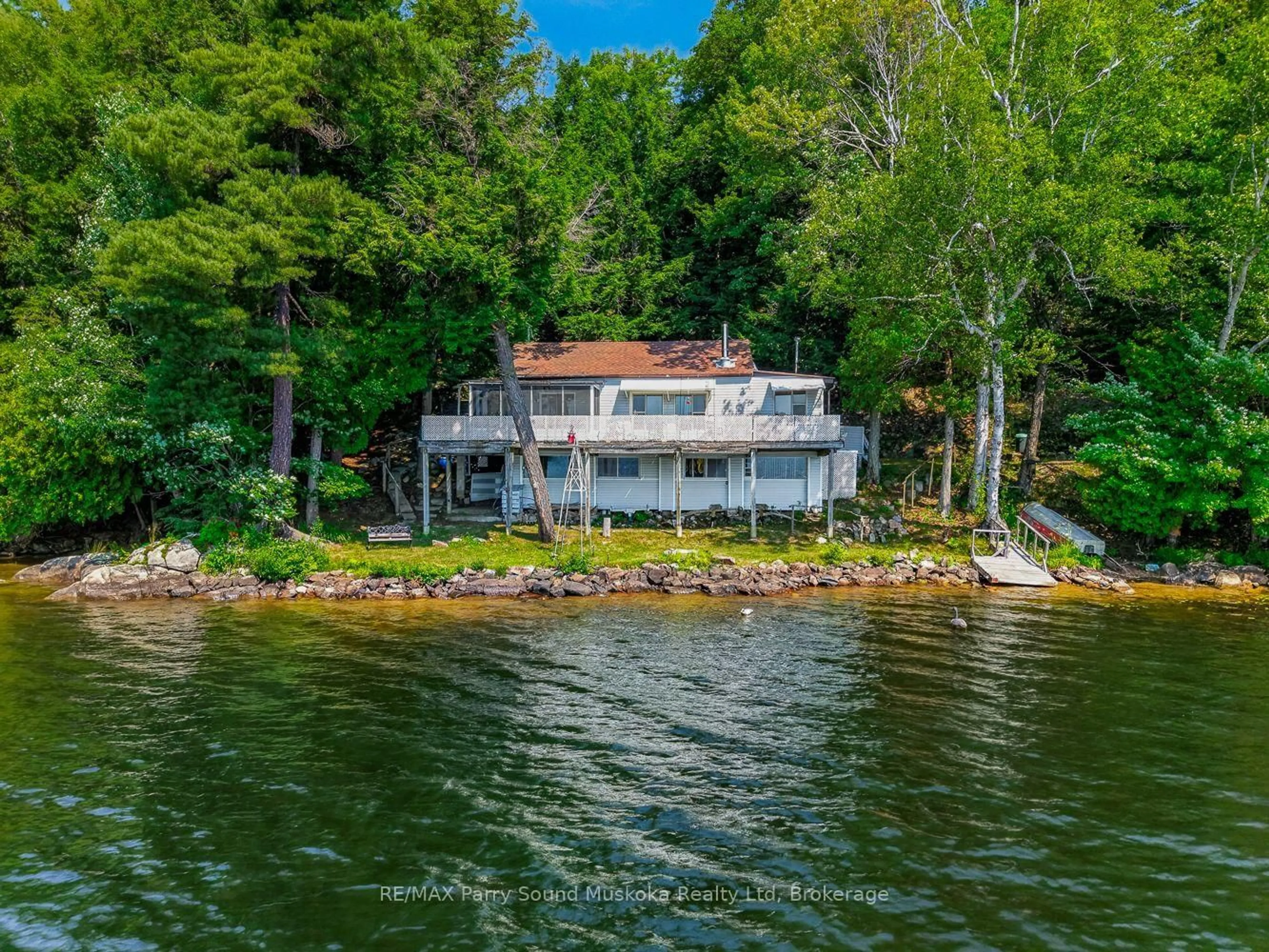 A pic from outside/outdoor area/front of a property/back of a property/a pic from drone, water/lake/river/ocean view for 87 Millies Rd, Seguin Ontario P2A 2W8