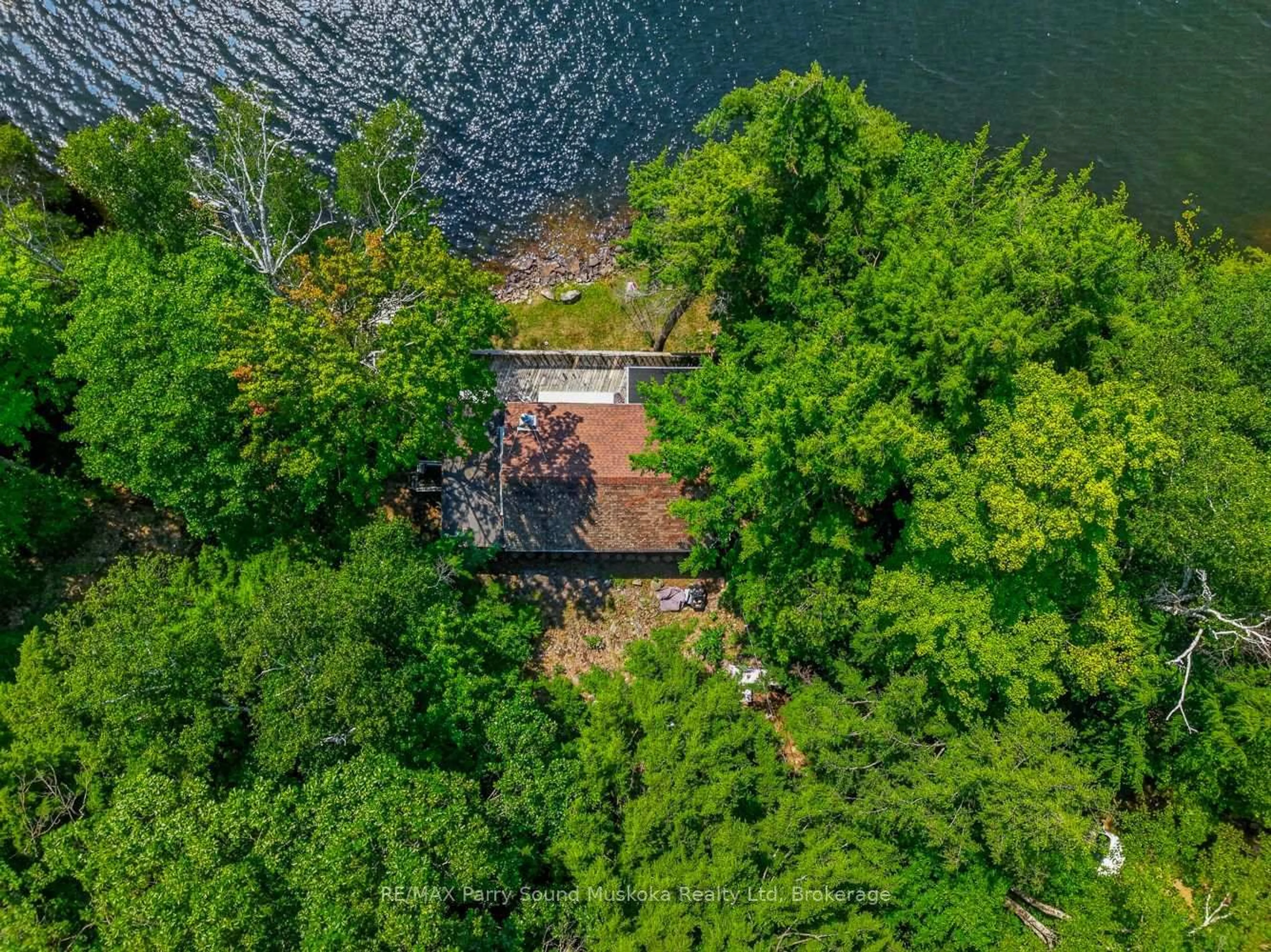 A pic from outside/outdoor area/front of a property/back of a property/a pic from drone, water/lake/river/ocean view for 87 Millies Rd, Seguin Ontario P2A 2W8