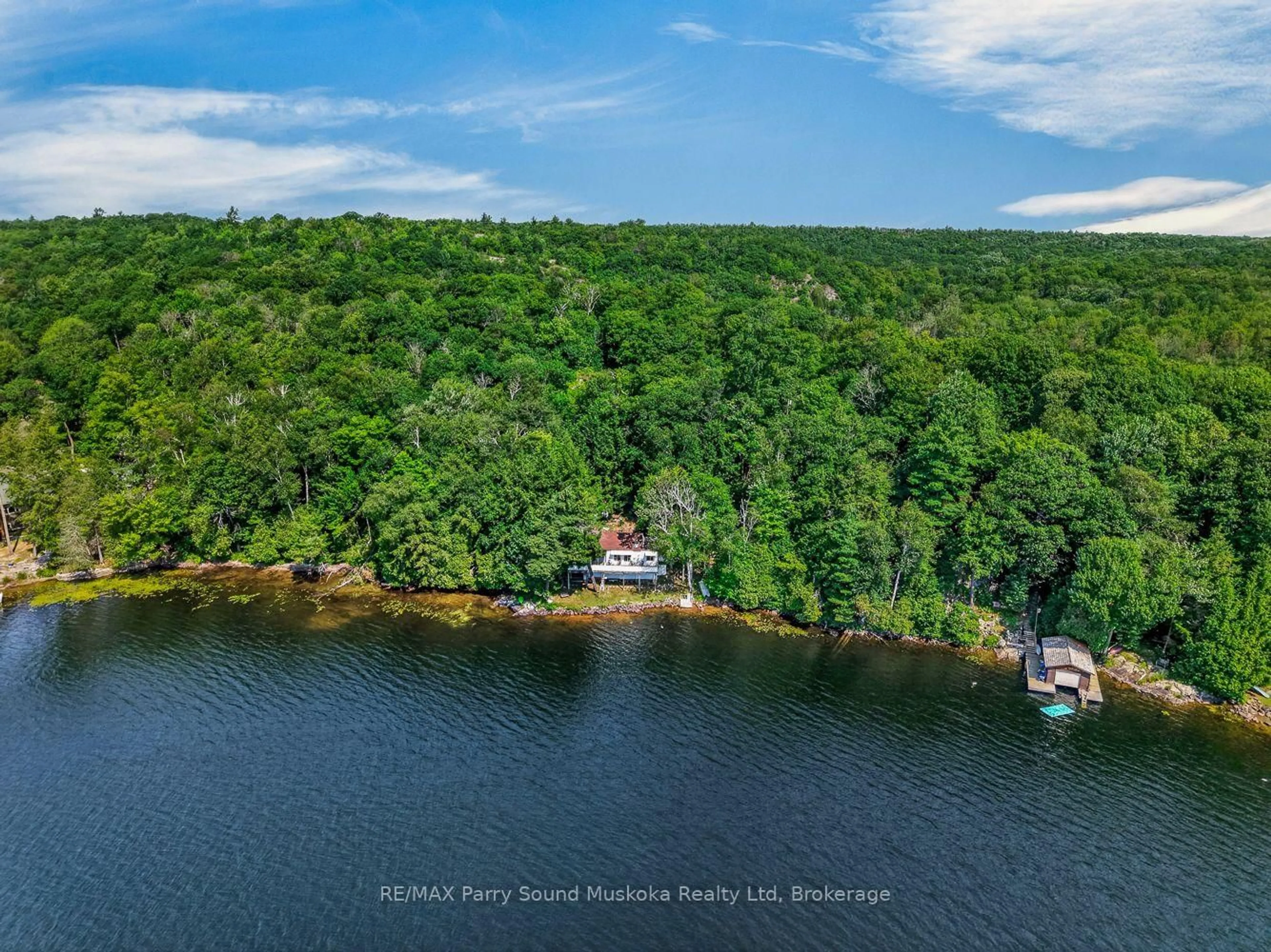 A pic from outside/outdoor area/front of a property/back of a property/a pic from drone, water/lake/river/ocean view for 87 Millies Rd, Seguin Ontario P2A 2W8