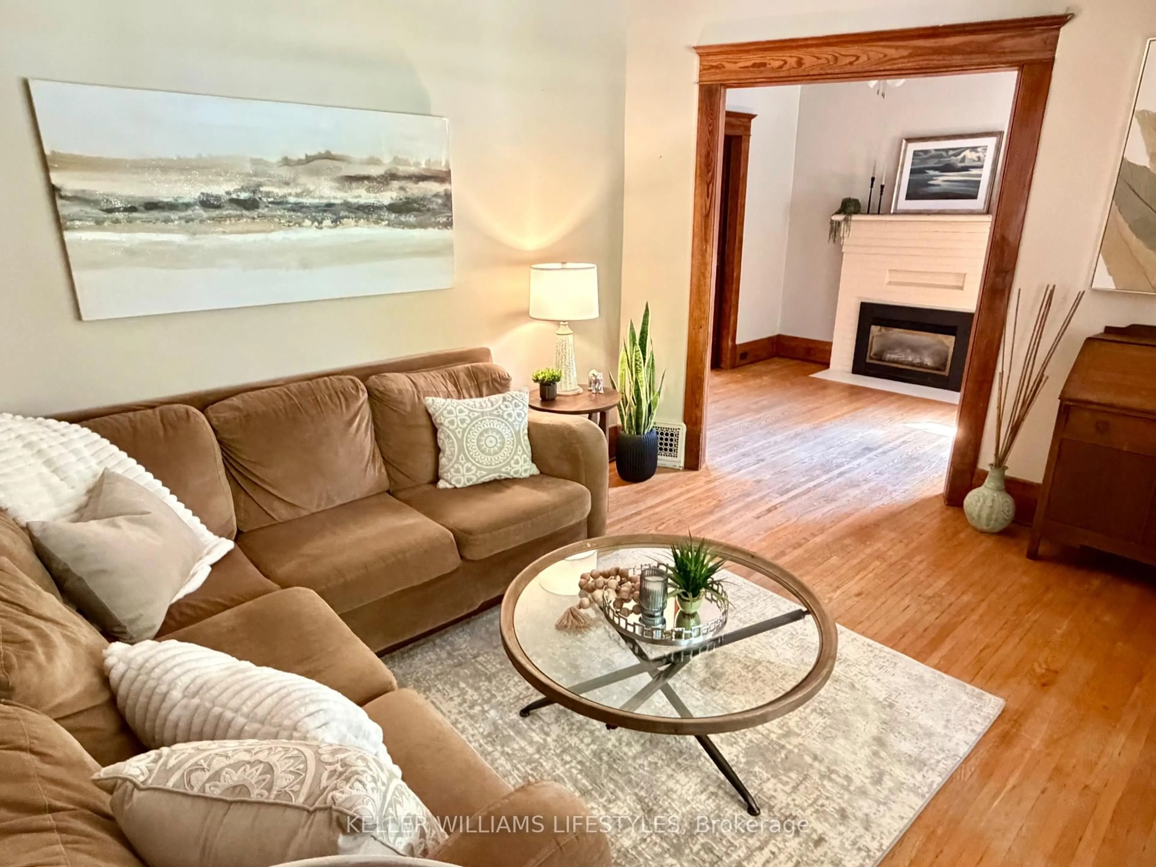 Living room with furniture, wood/laminate floor for 5 Cove Rd, London South Ontario N6J 1H7