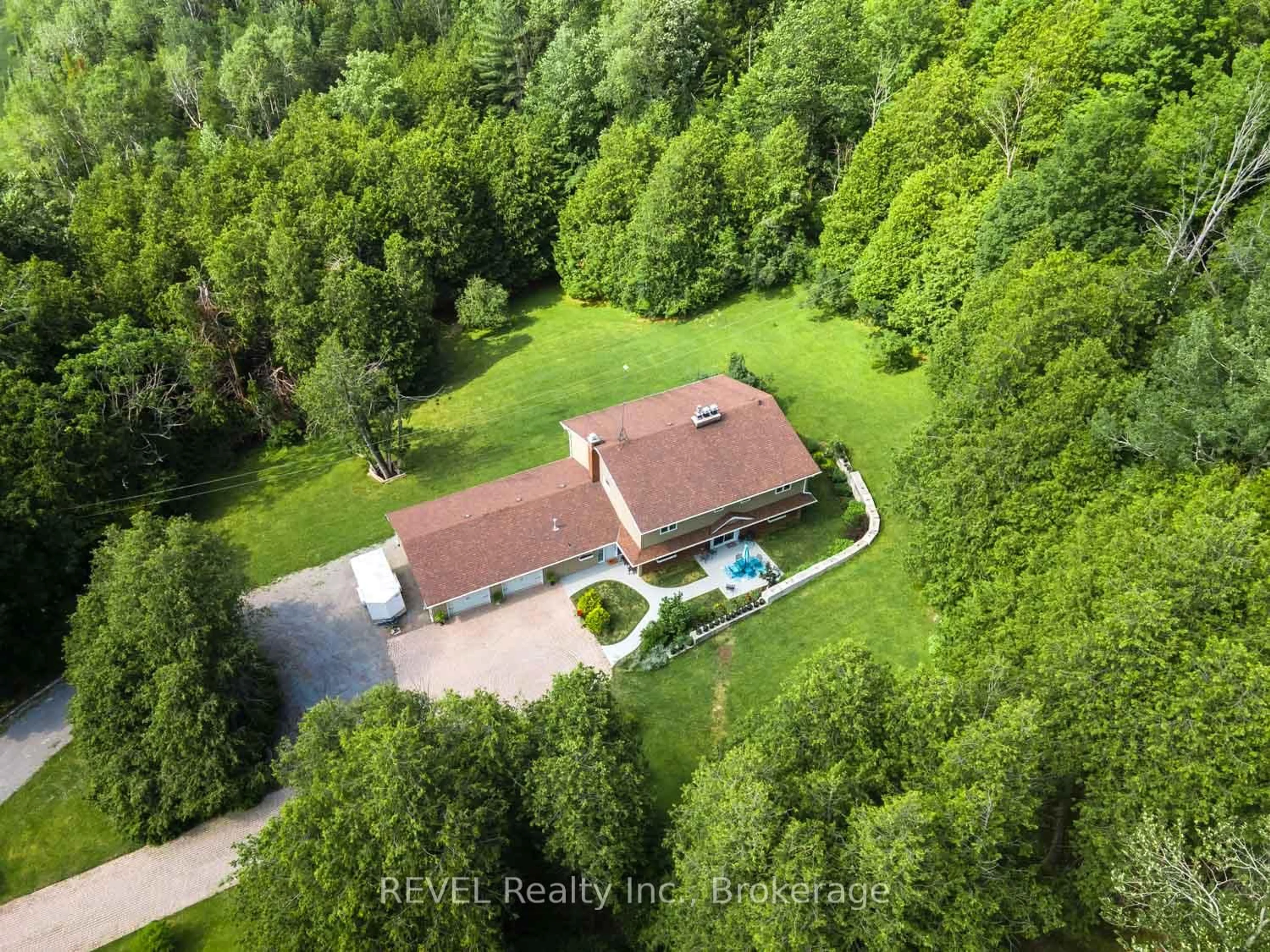 A pic from outside/outdoor area/front of a property/back of a property/a pic from drone, forest/trees view for 208 Ski Hill Rd, Kawartha Lakes Ontario L0A 1A0