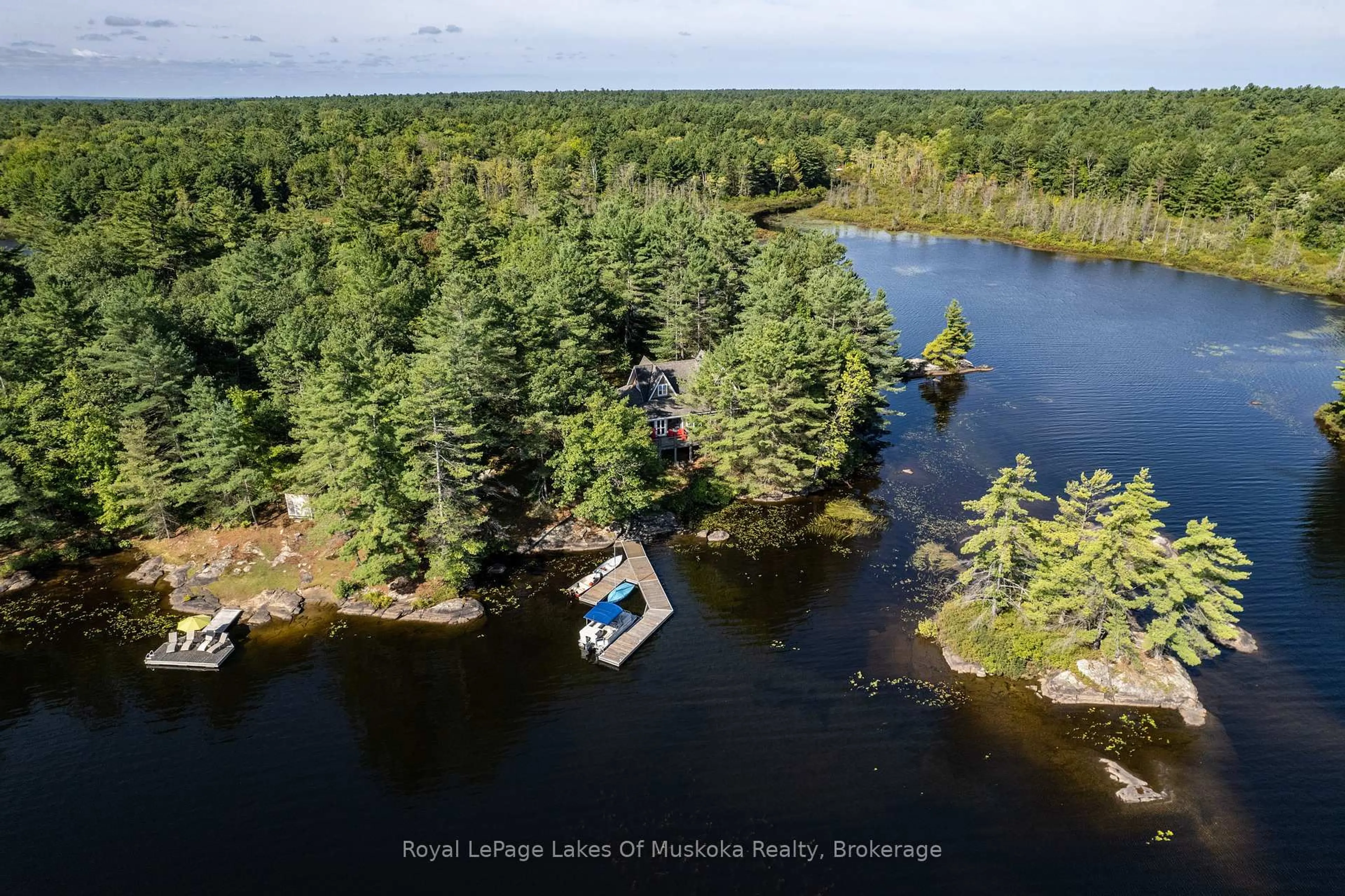 A pic from outside/outdoor area/front of a property/back of a property/a pic from drone, water/lake/river/ocean view for 27 Island 2ml, Gravenhurst Ontario P0E 1G0