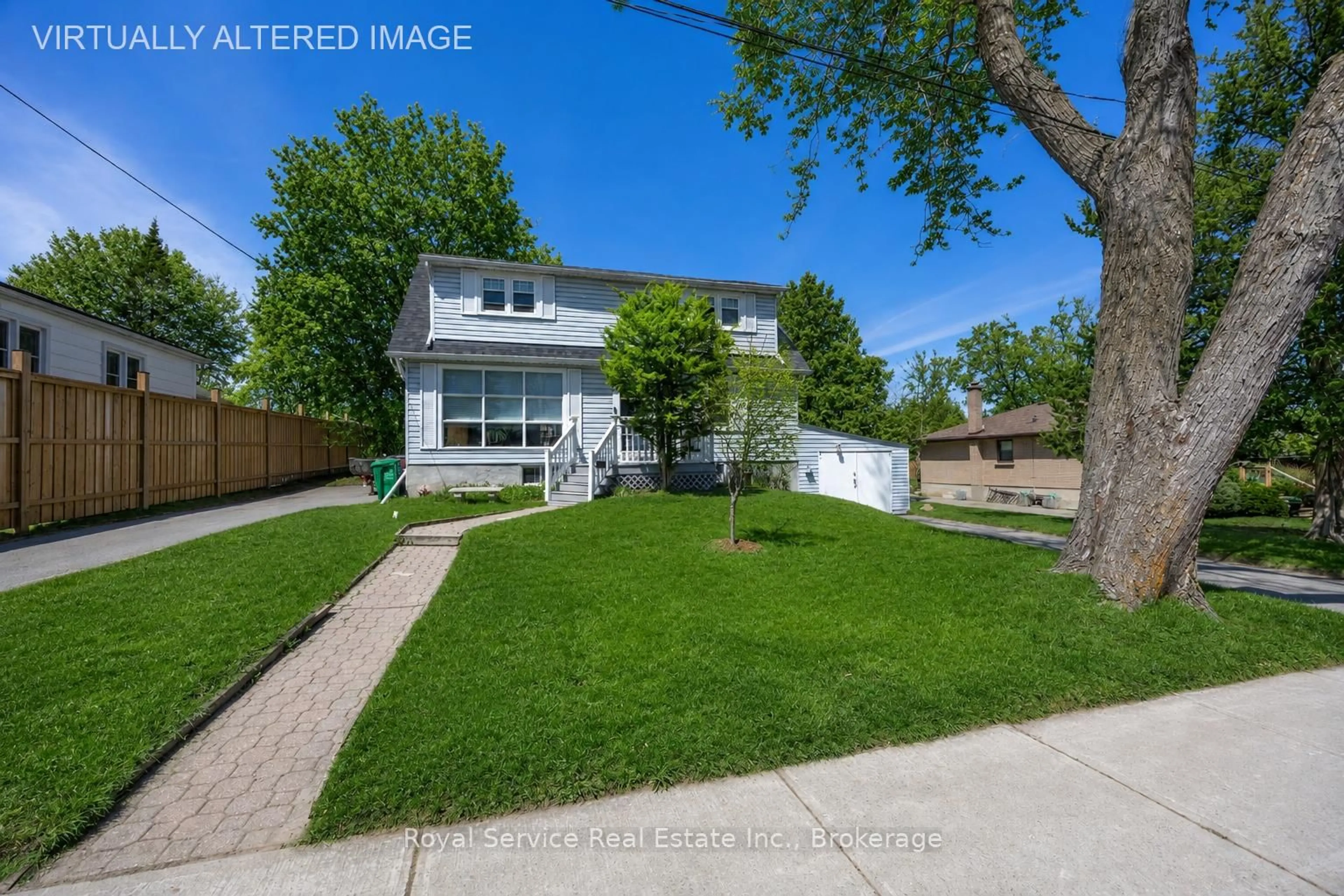 A pic from outside/outdoor area/front of a property/back of a property/a pic from drone, street for 210 Shelbourne St, Peterborough Ontario K9H 5K4