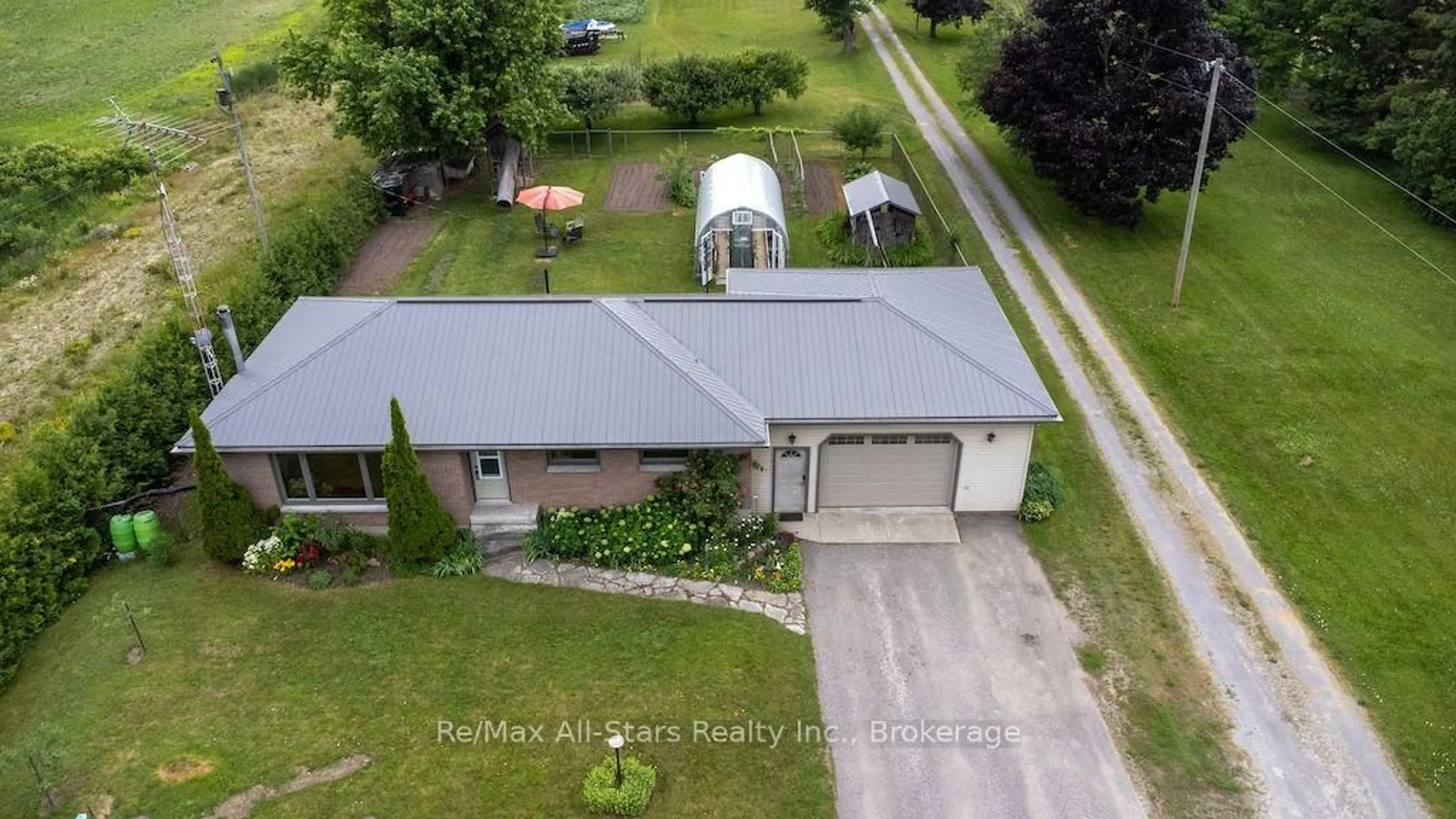 A pic from outside/outdoor area/front of a property/back of a property/a pic from drone, street for 1571 Elm Tree Rd, Kawartha Lakes Ontario K9V 4R1