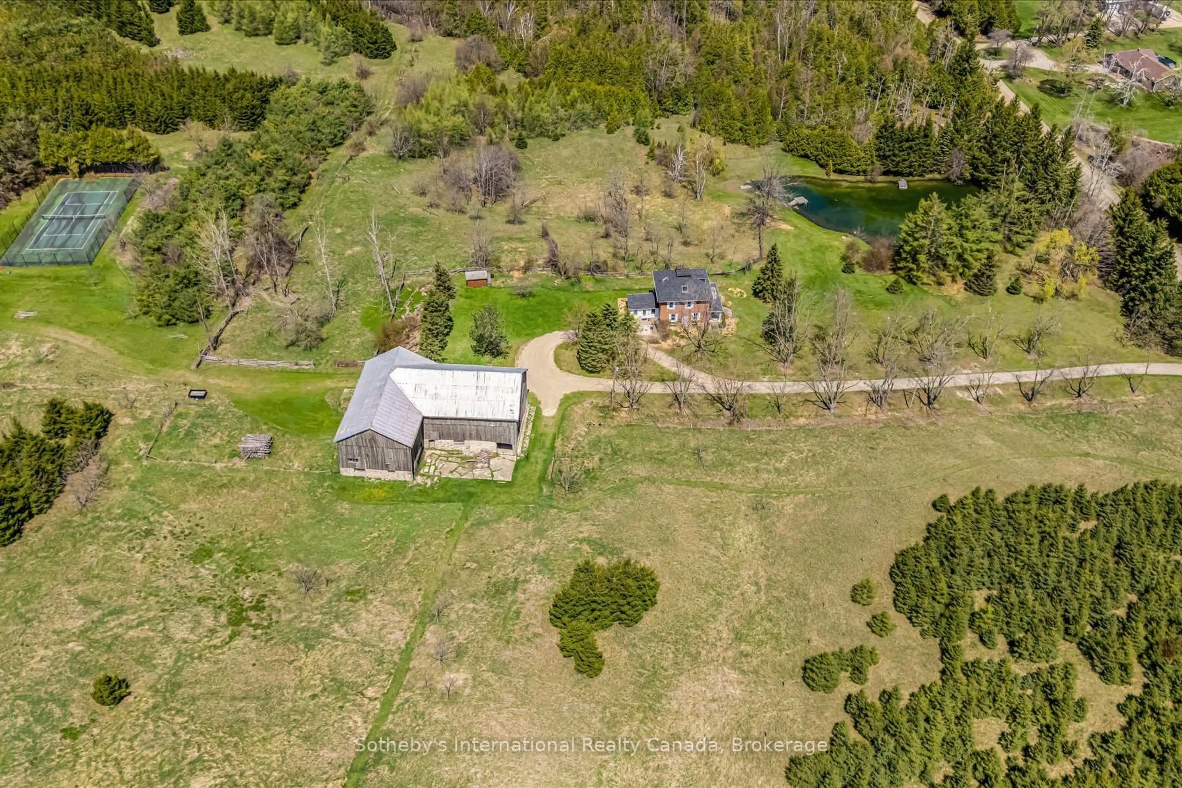 A pic from outside/outdoor area/front of a property/back of a property/a pic from drone, unknown for 717218 1st Line E EHS, Mulmur Ontario L9V 0G2