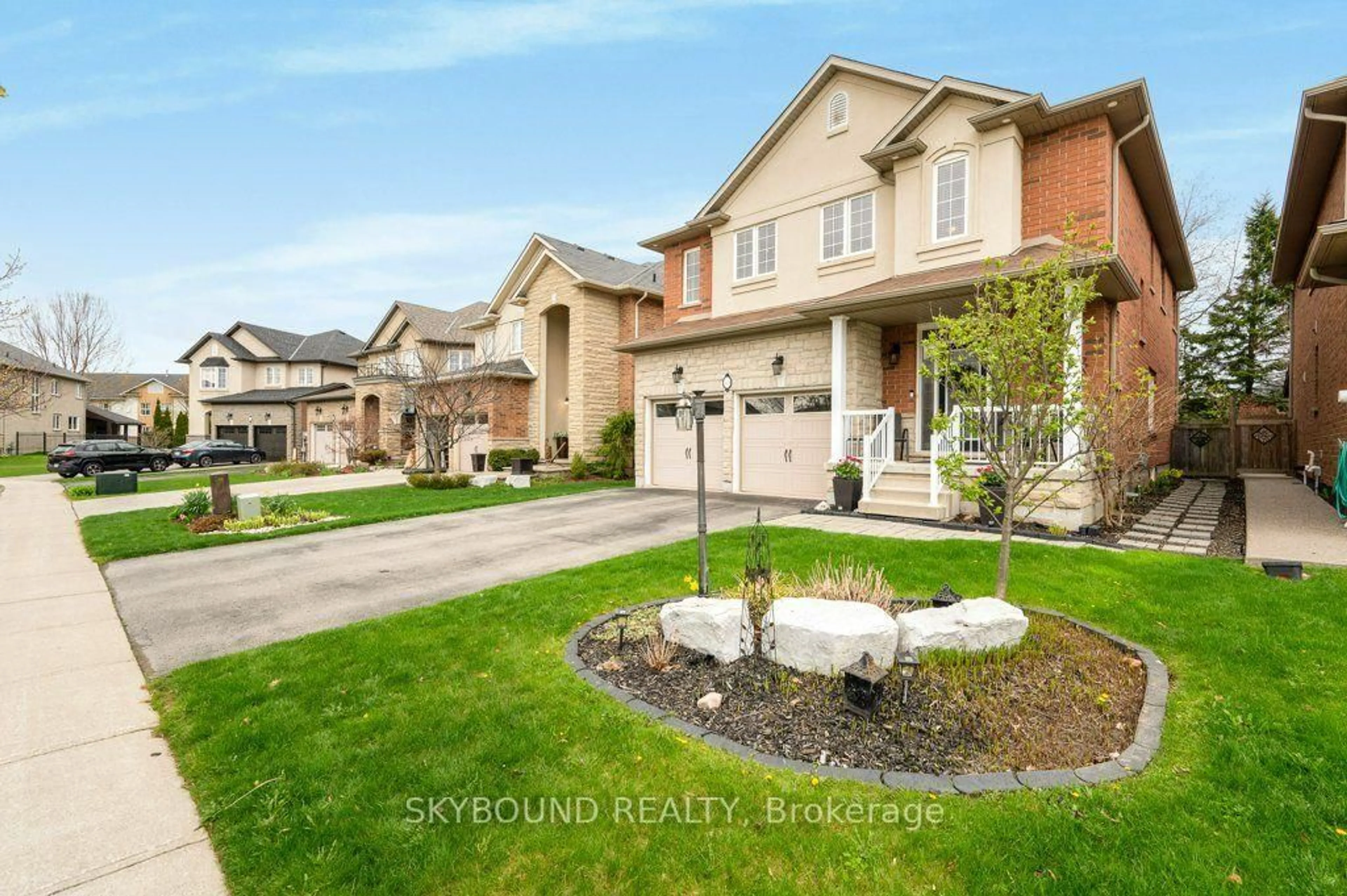 Home with brick exterior material, street for 365 Valridge Dr, Hamilton Ontario L9G 0B1