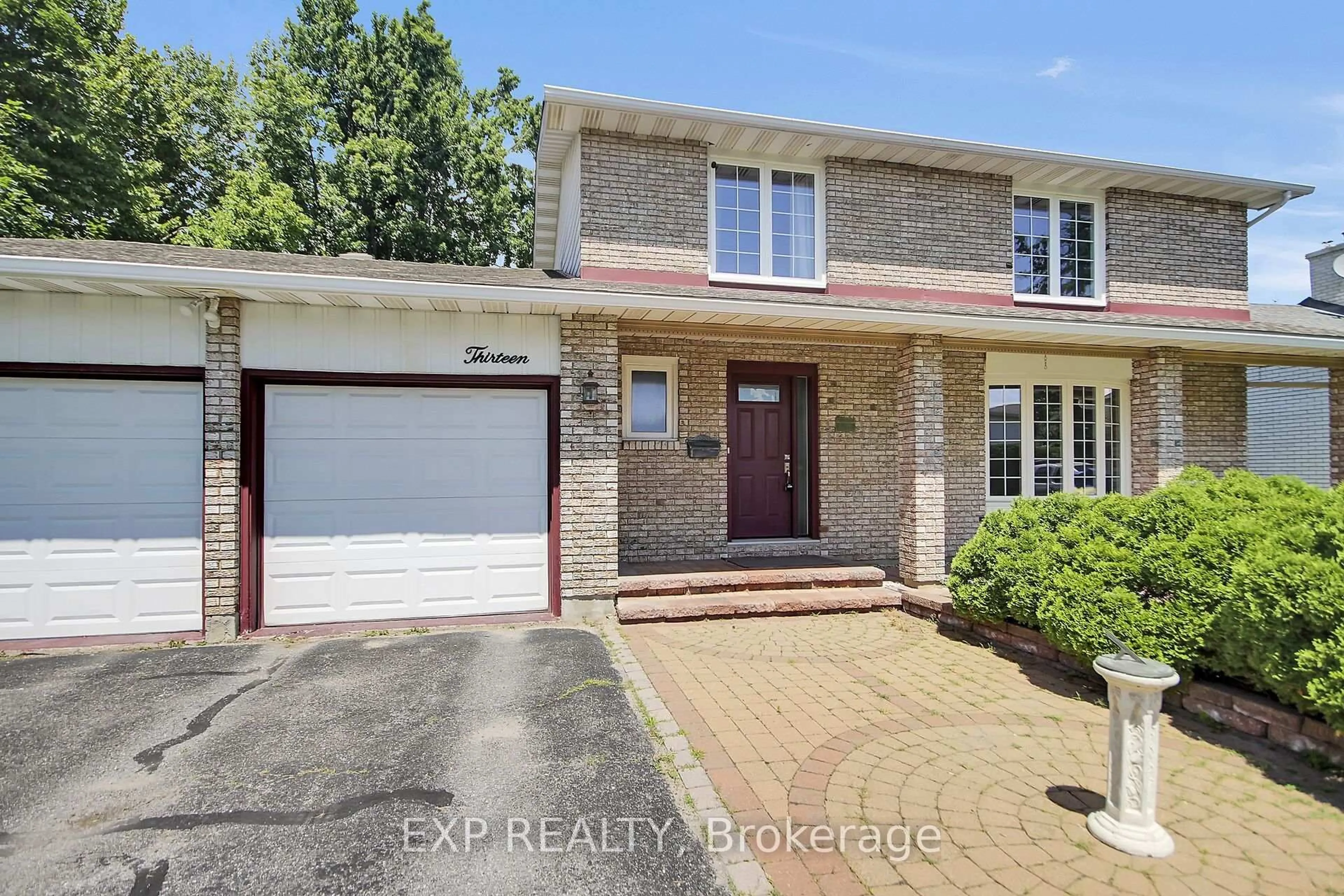 Home with brick exterior material, street for 13 Shanel Pl, Barrhaven Ontario K2J 1C3