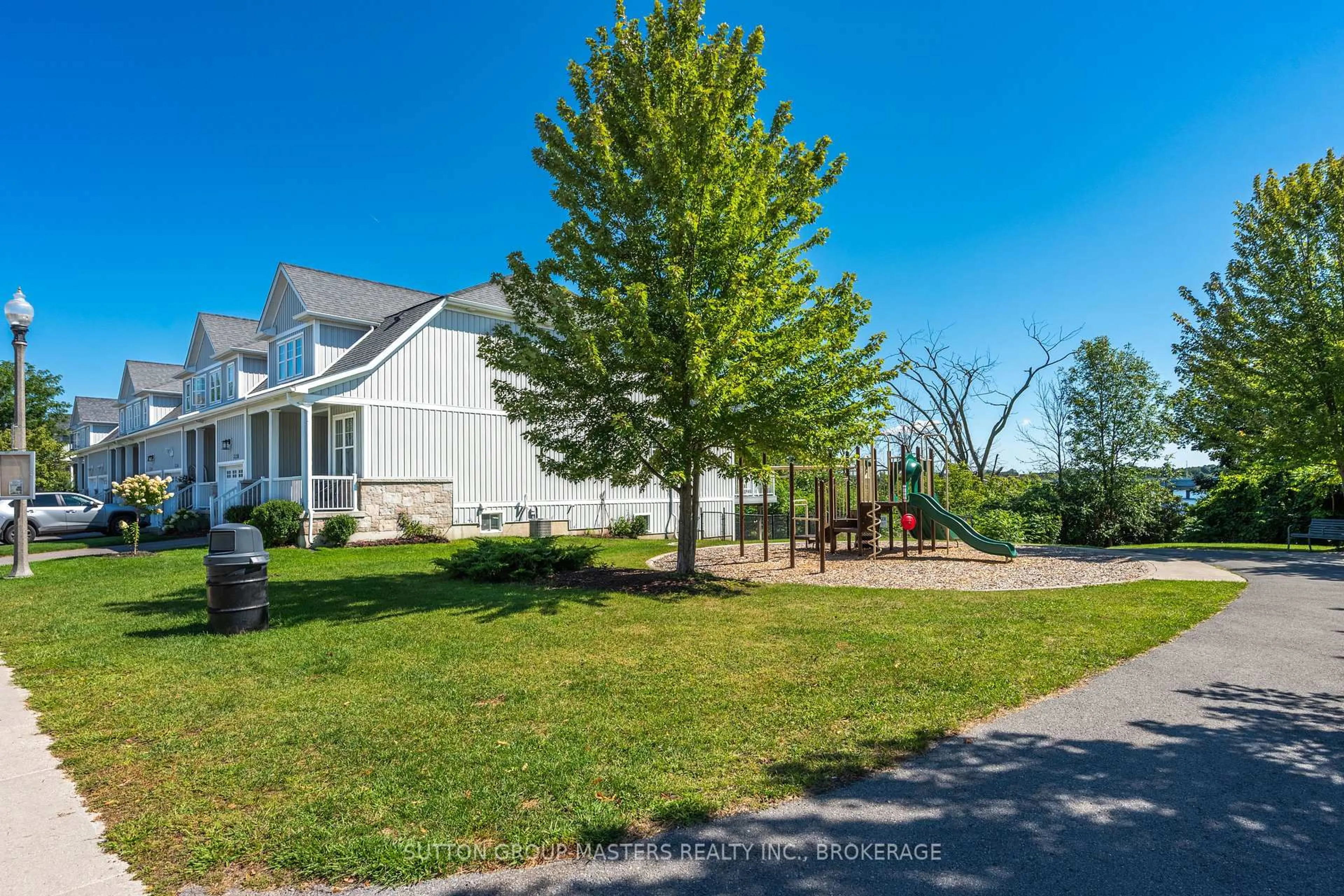 A pic from outside/outdoor area/front of a property/back of a property/a pic from drone, street for 728 Newmarket Lane, Kingston Ontario K7K 6K7