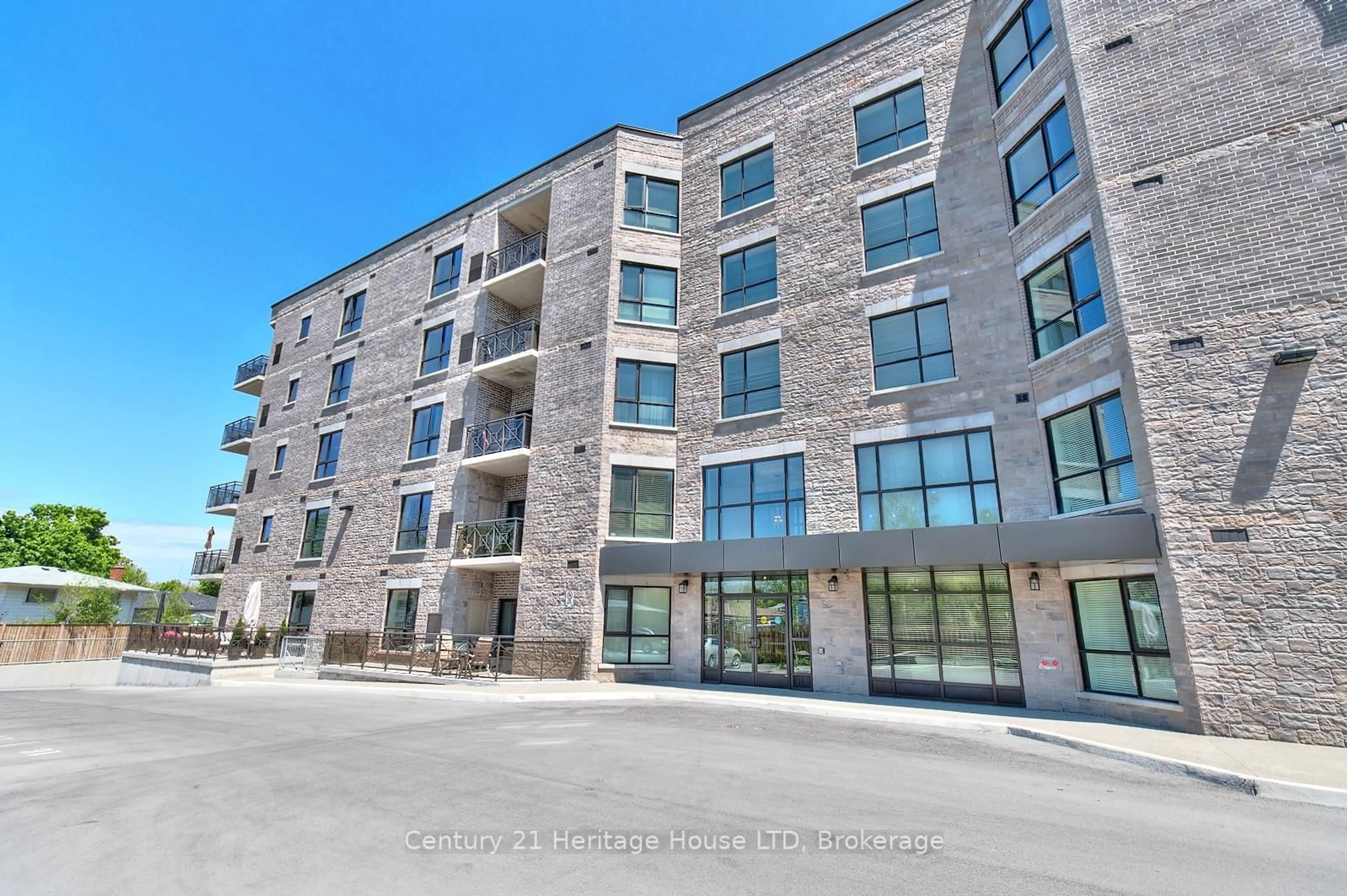 A pic from outside/outdoor area/front of a property/back of a property/a pic from drone, building for 379 Scott St #307, St. Catharines Ontario L2M 3W2