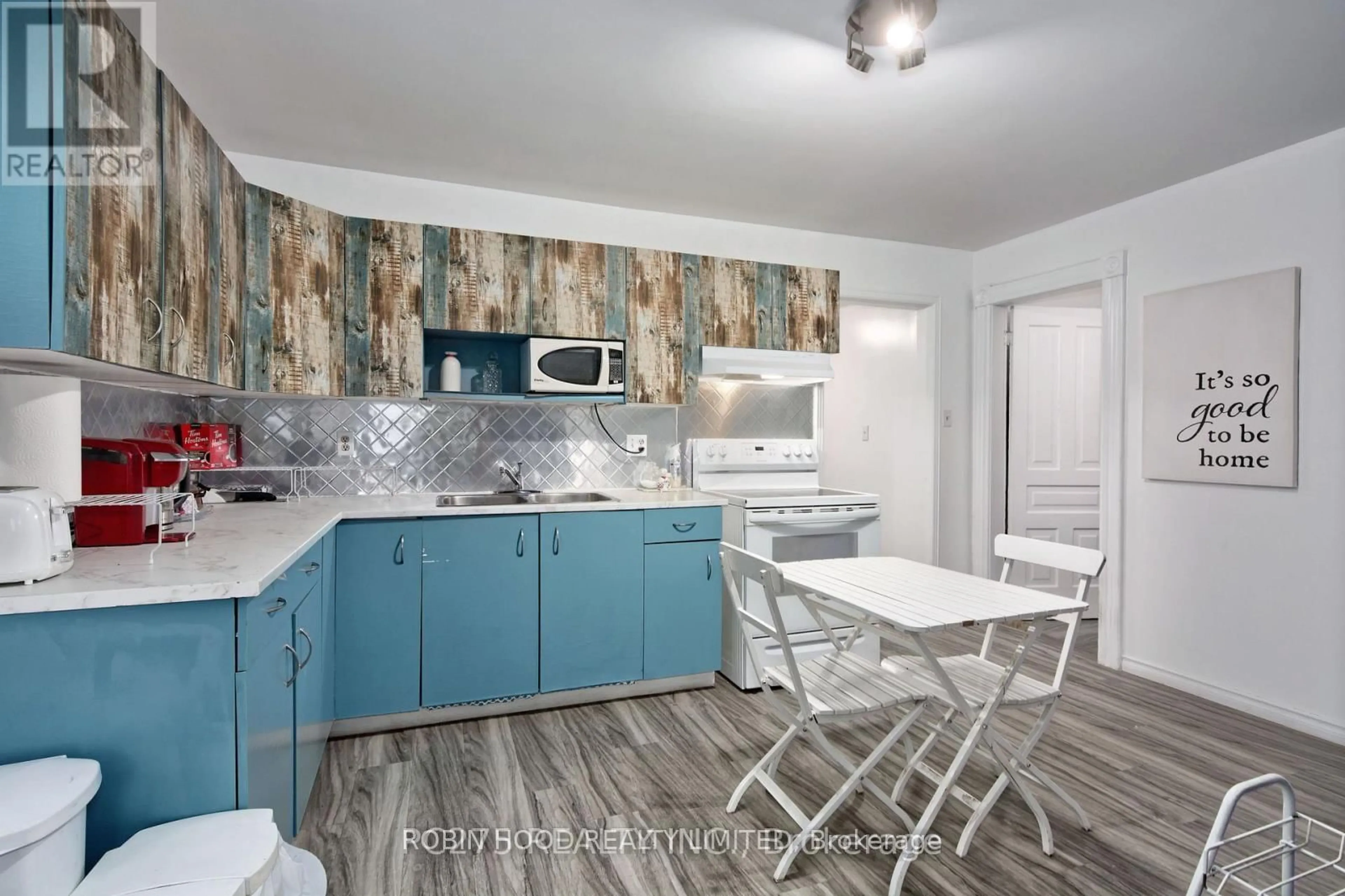 Open concept kitchen, ceramic/tile floor for 173 Adelaide St #N/A, London East Ontario N6B 3H1