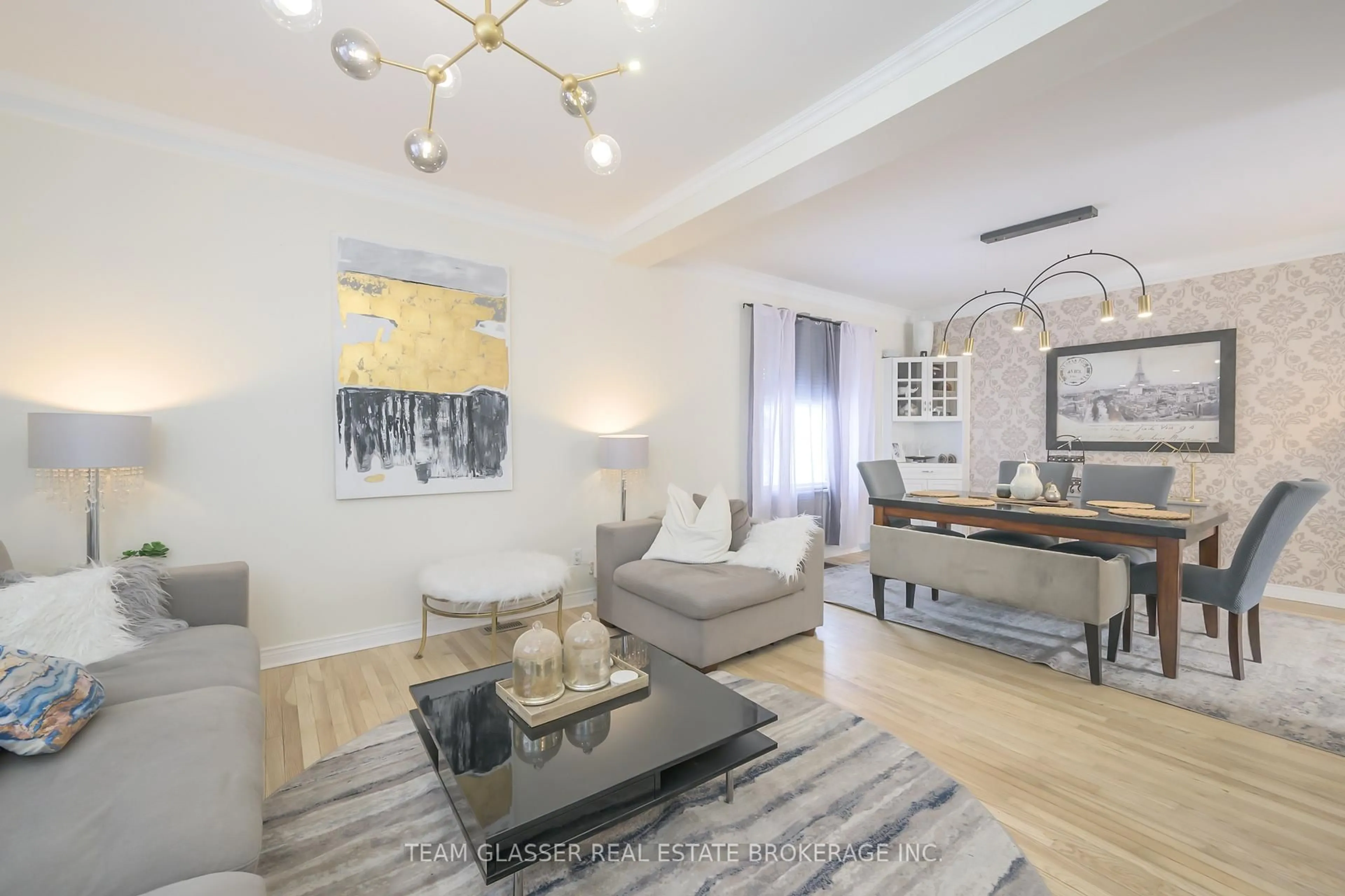 Living room with furniture, wood/laminate floor for 63 Euclid Ave, London South Ontario N6C 3G8