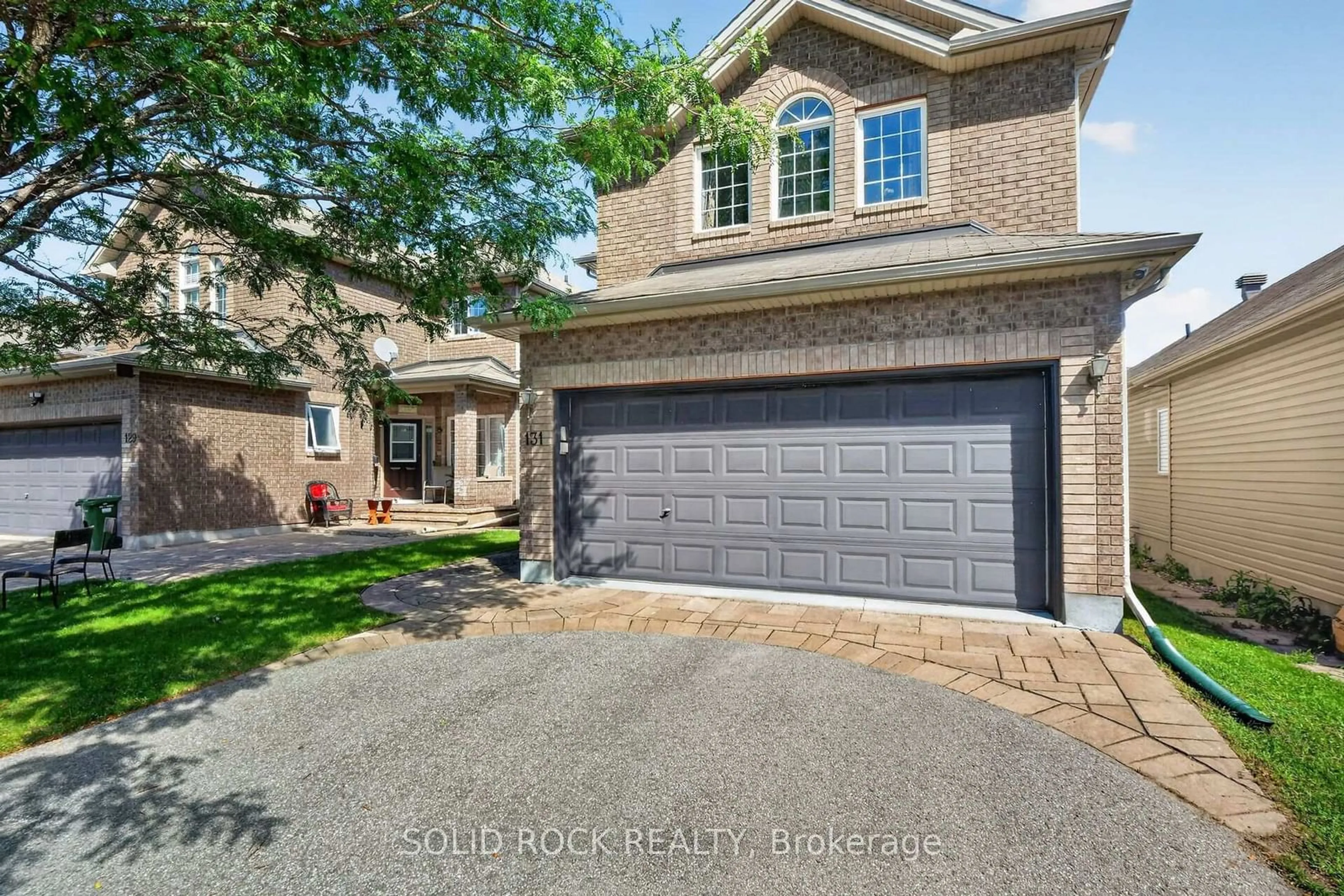 Home with brick exterior material, street for 131 Finn Crt, Ottawa Ontario K1V 2C6