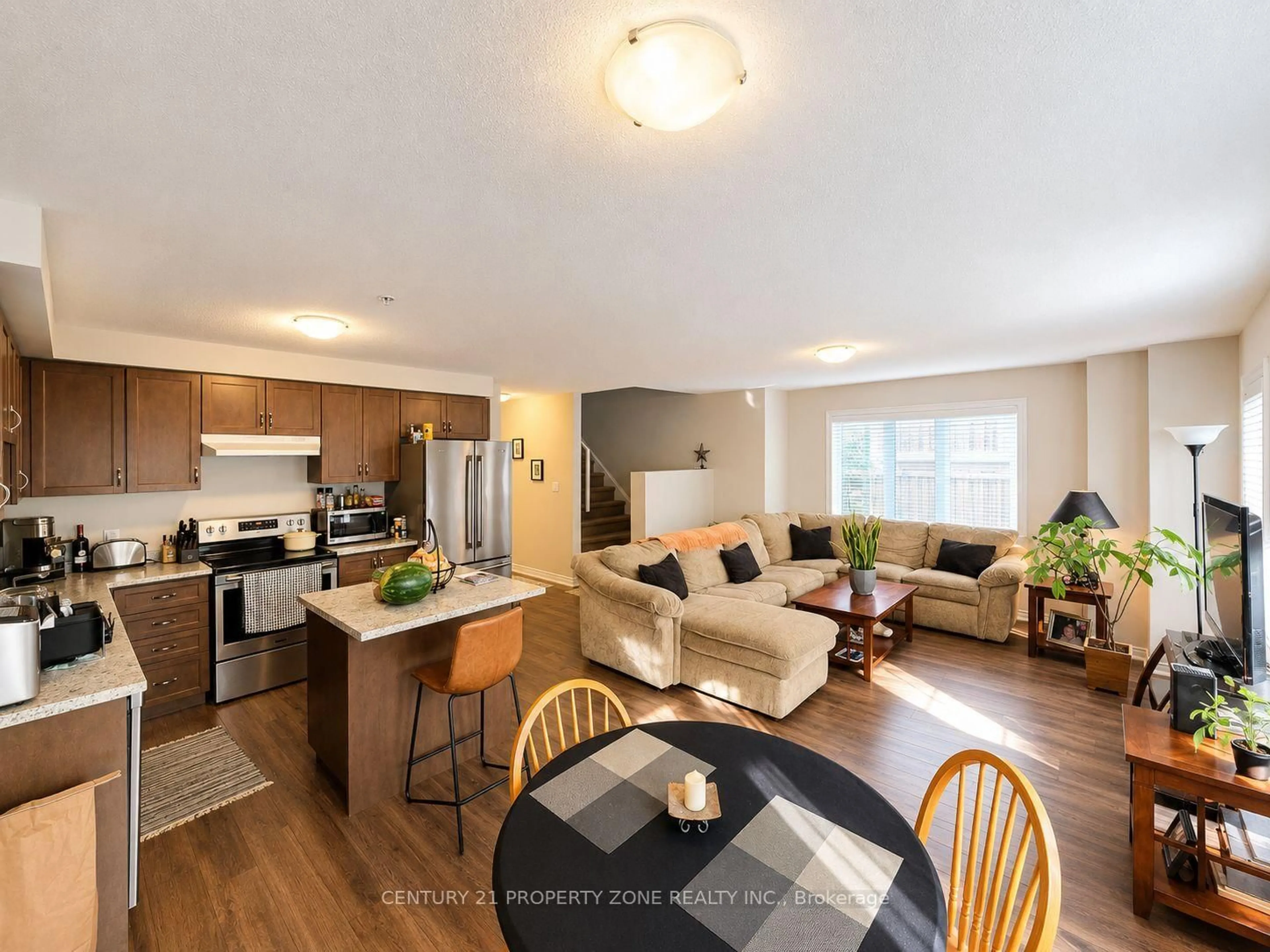 Open concept kitchen, wood/laminate floor for 60 Canterbury Dr #12, St. Catharines Ontario L2P 0E7