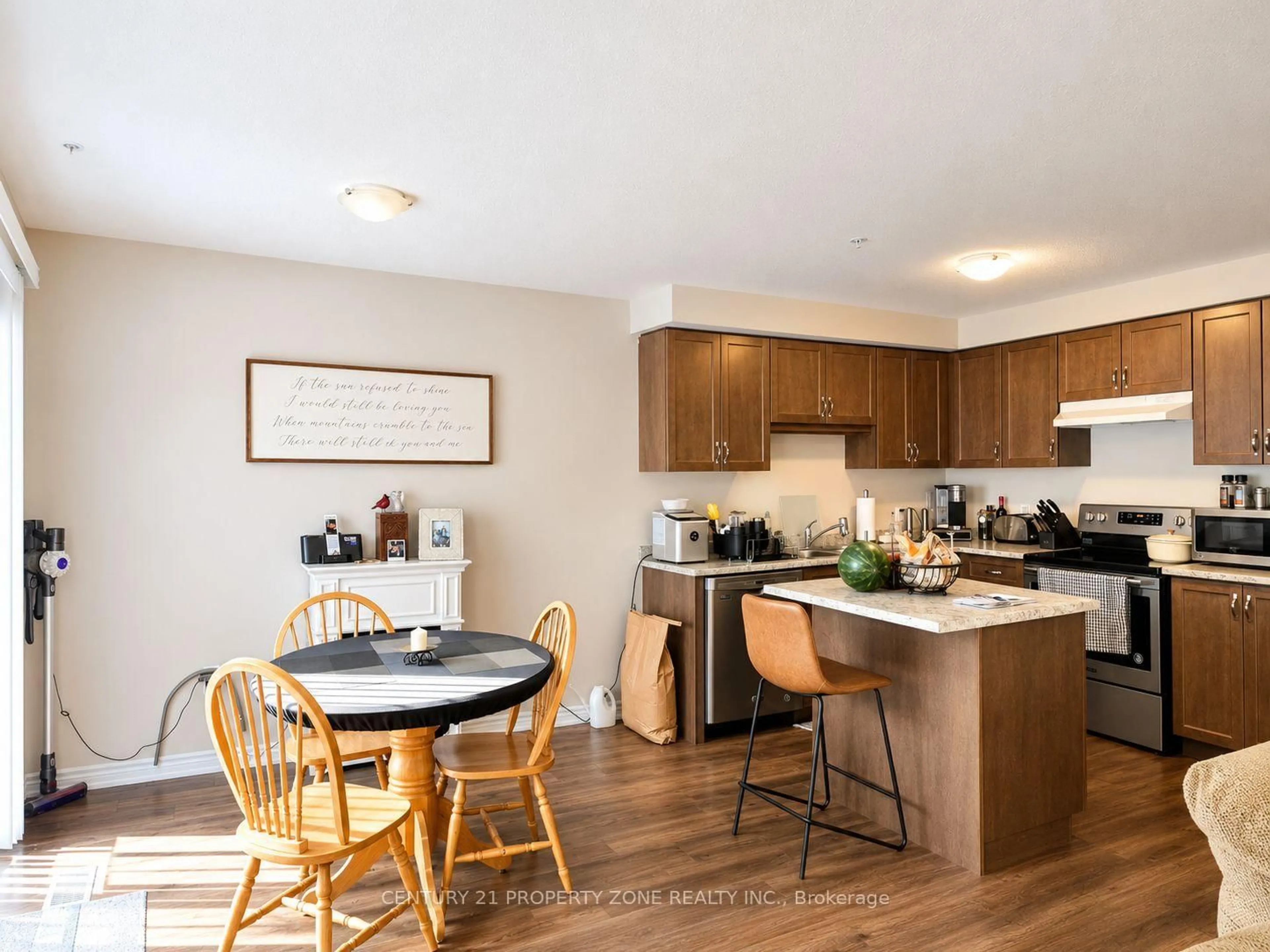 Open concept kitchen, wood/laminate floor for 60 Canterbury Dr #12, St. Catharines Ontario L2P 0E7