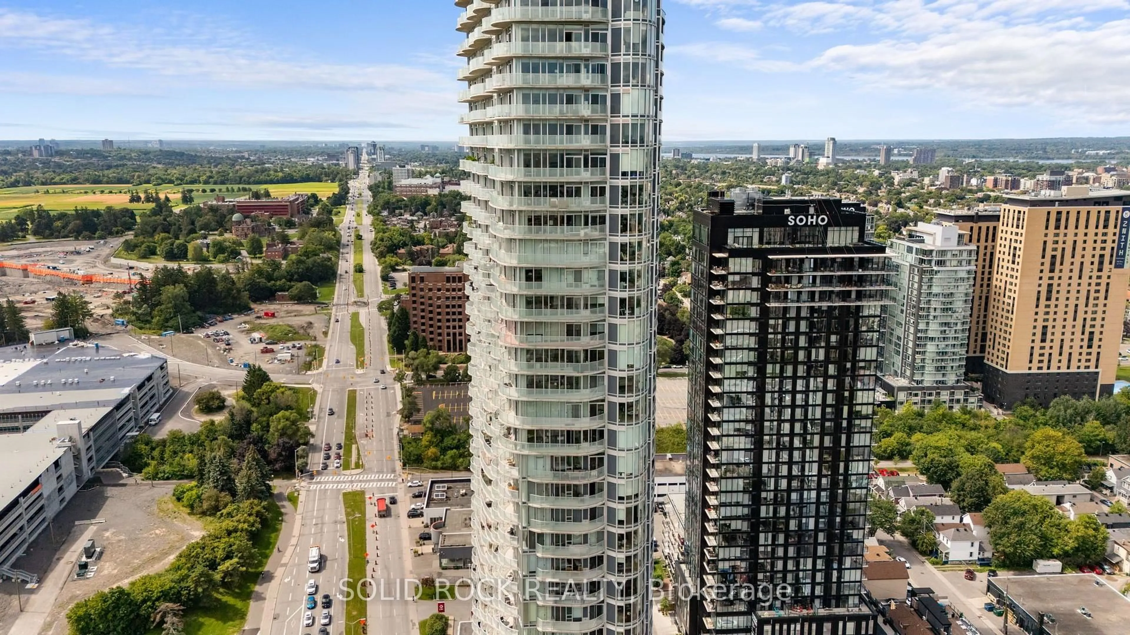 A pic from outside/outdoor area/front of a property/back of a property/a pic from drone, city buildings view from balcony for 805 Carling Ave #2308, Ottawa Ontario K1S 5W9
