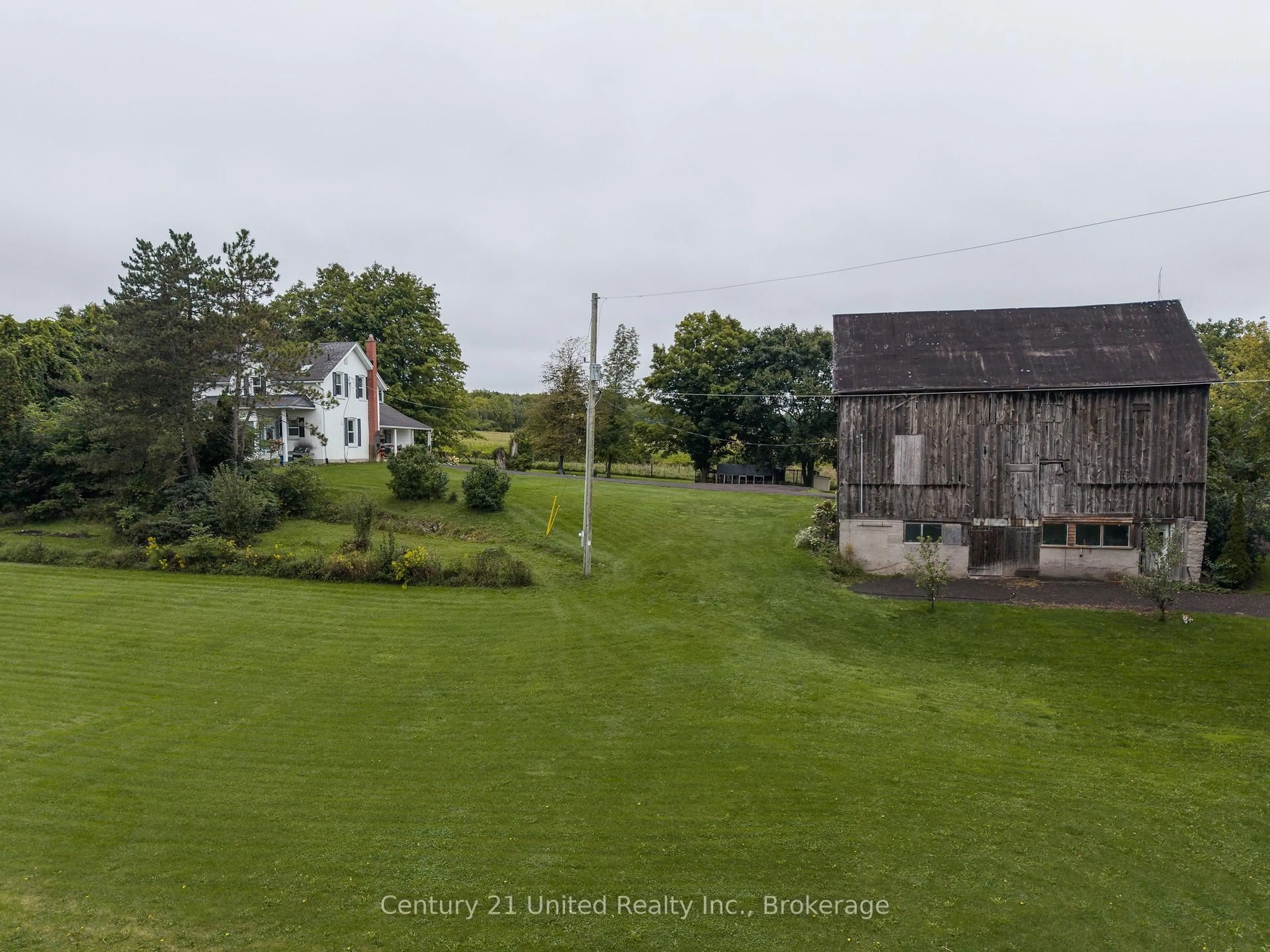 A pic from outside/outdoor area/front of a property/back of a property/a pic from drone, unknown for 15710 County Rd 29, Brighton Ontario K0L 1L0