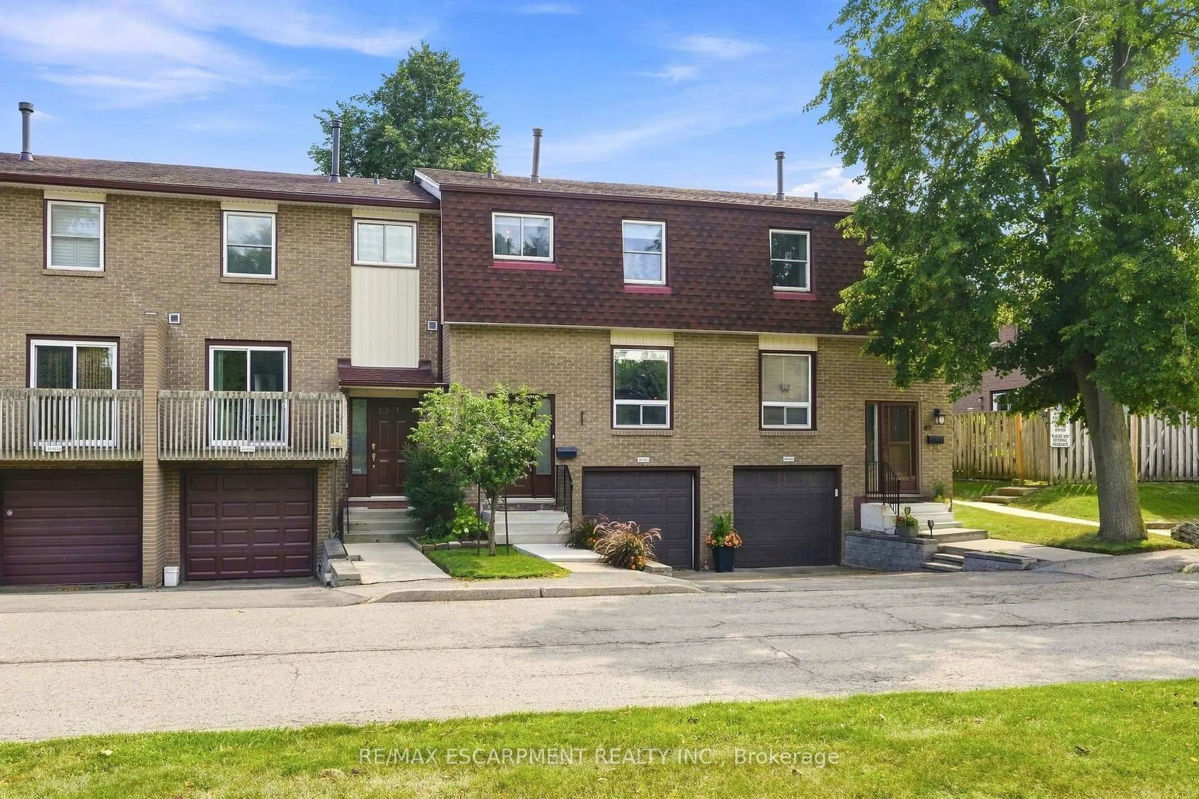 Home with brick exterior material, street for 1115 Paramount Dr #50, Hamilton Ontario L8J 1P6