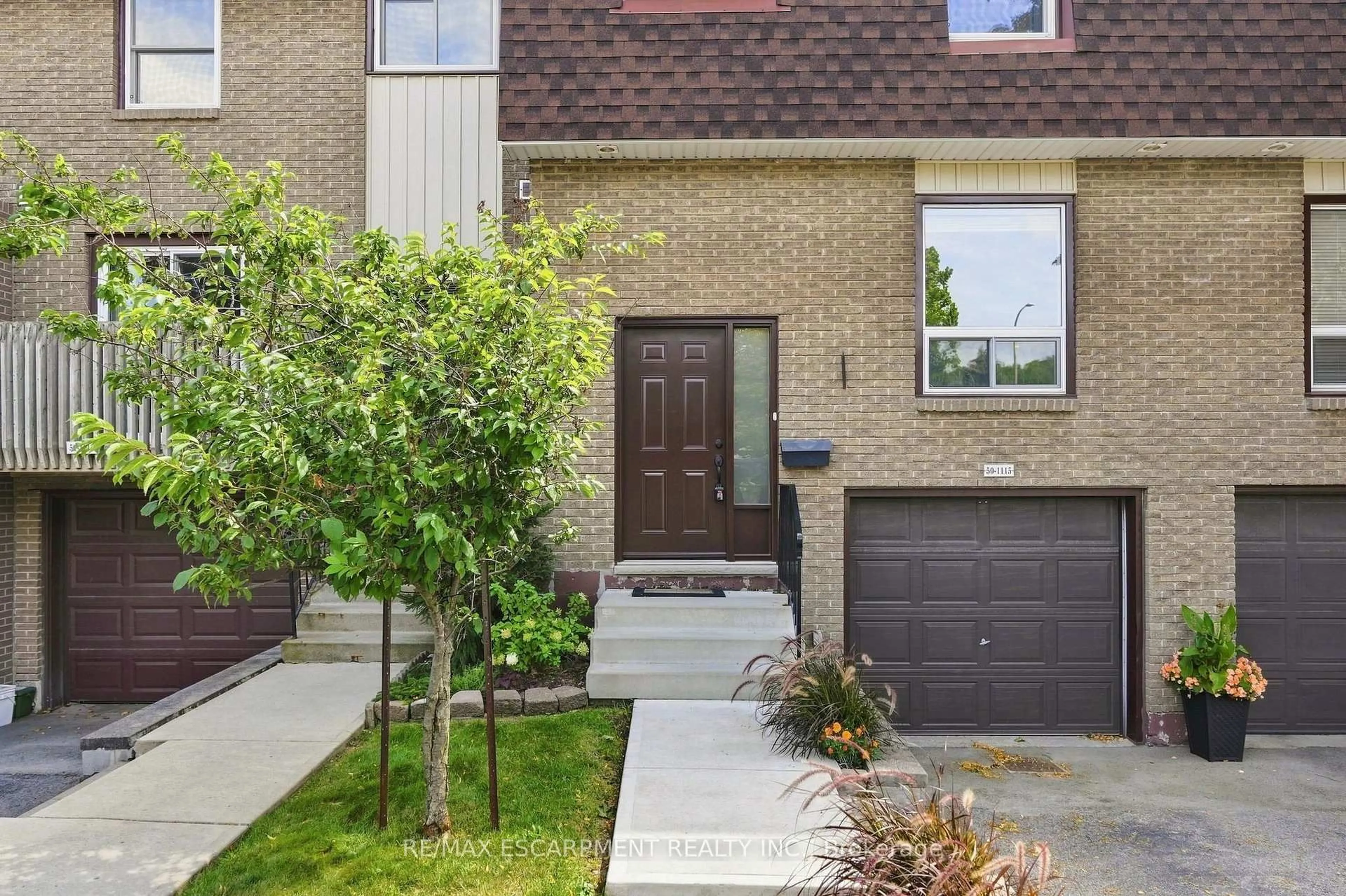 Home with brick exterior material, street for 1115 Paramount Dr #50, Hamilton Ontario L8J 1P6