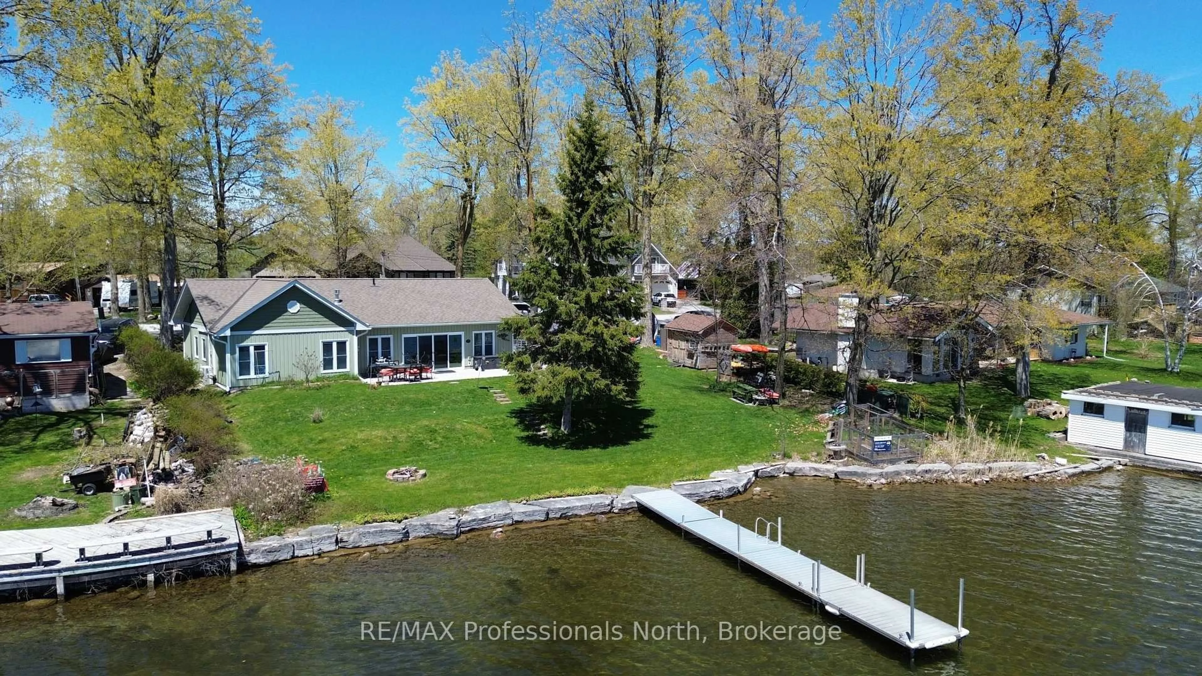 A pic from outside/outdoor area/front of a property/back of a property/a pic from drone, water/lake/river/ocean view for 563 Dalhaven Rd, Selwyn Ontario K0L 1T0
