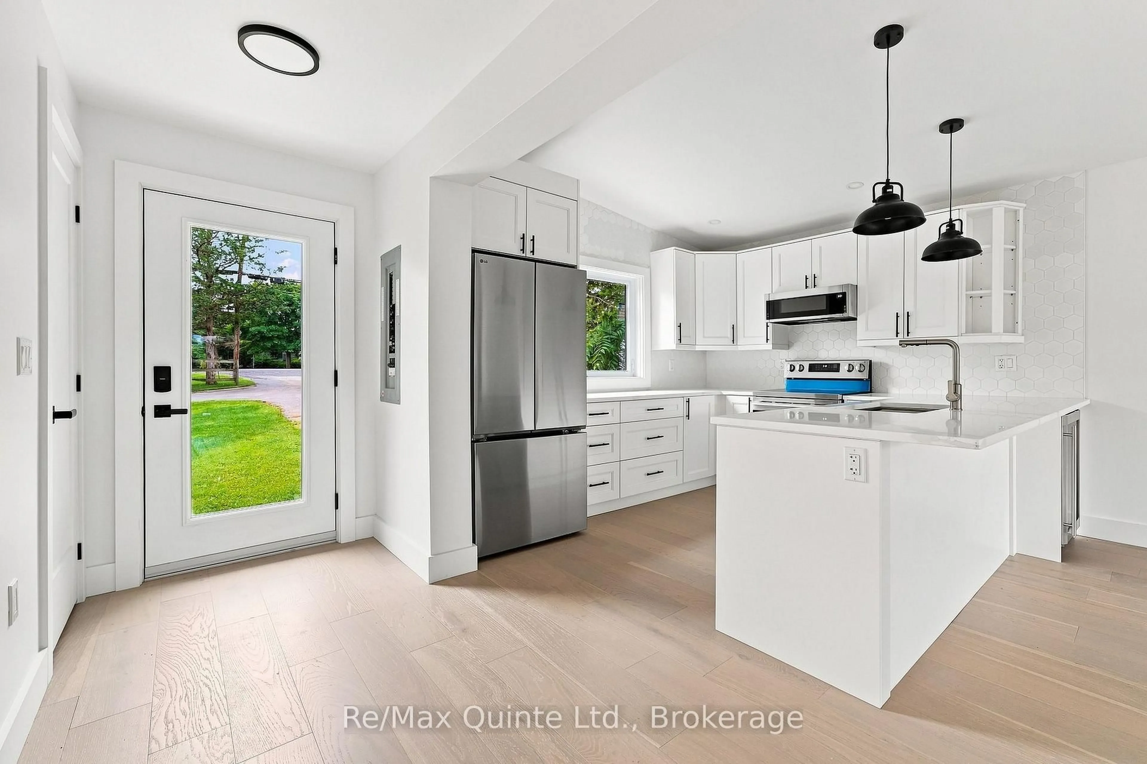 Open concept kitchen, ceramic/tile floor for 417 County Road 28, Prince Edward County Ontario K8P 3J1