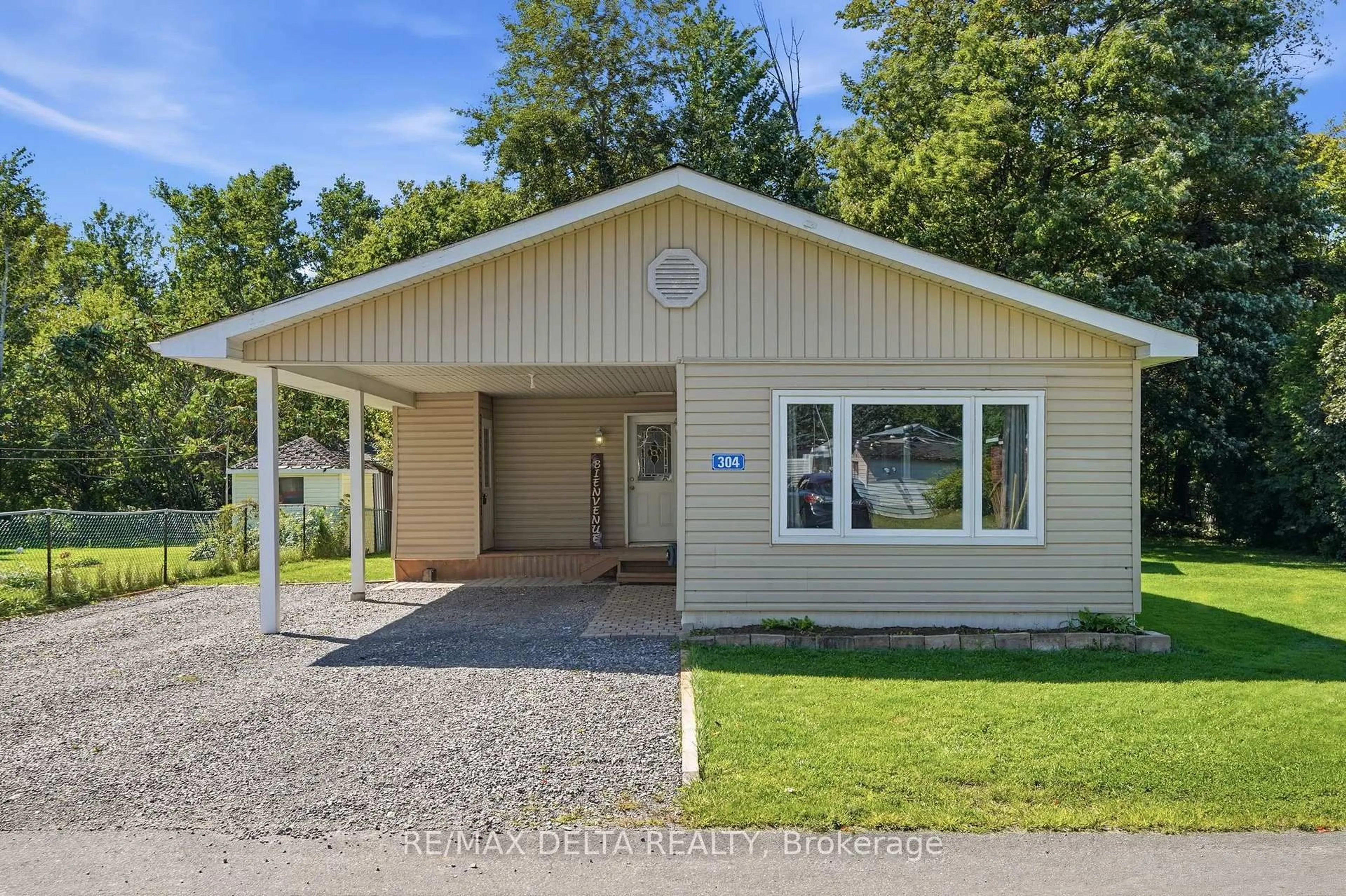 Home with vinyl exterior material, street for 8250 County Road 17 Rd #304, Clarence-Rockland Ontario K4K 1K7