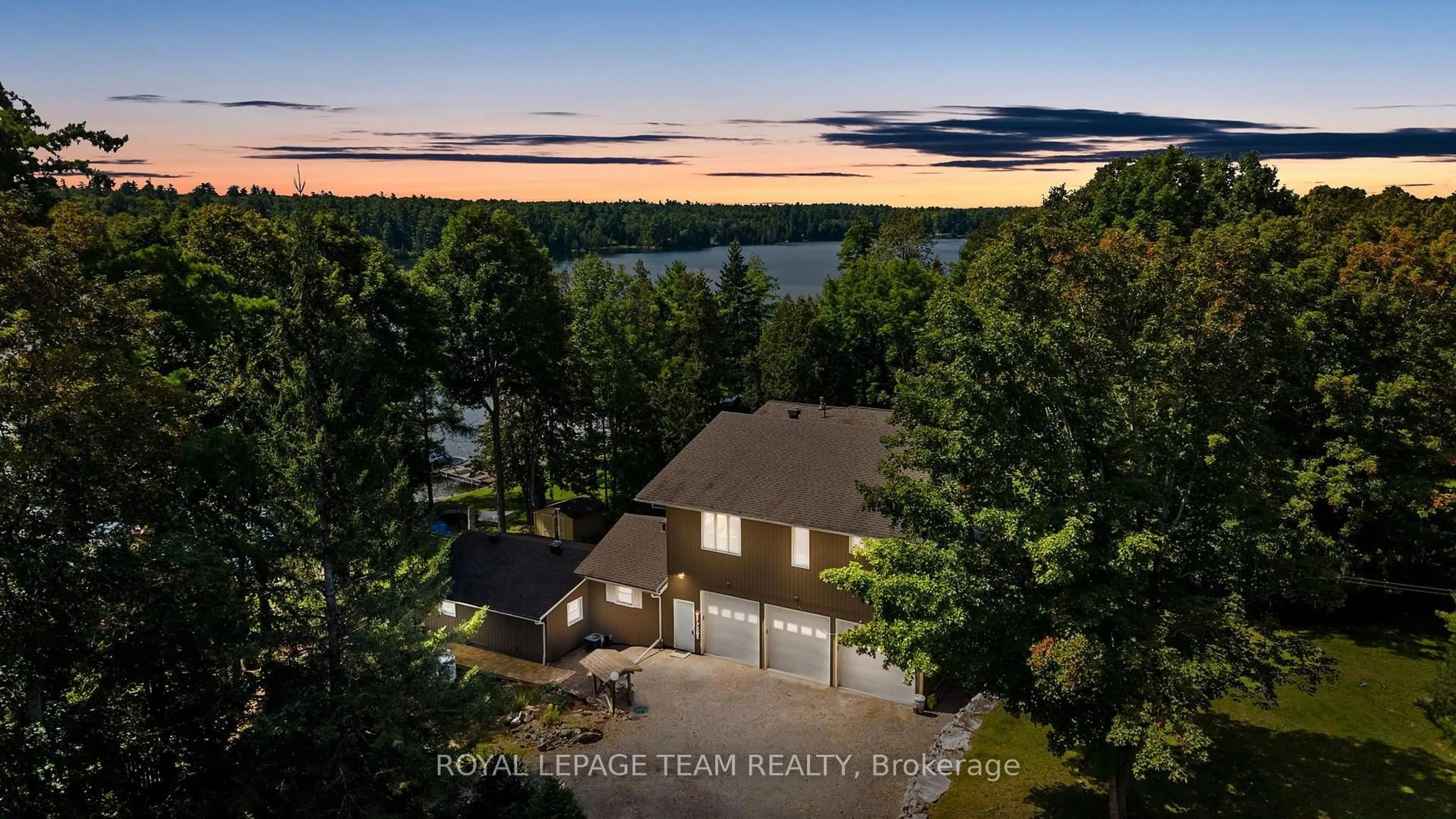 A pic from outside/outdoor area/front of a property/back of a property/a pic from drone, water/lake/river/ocean view for 134 Cedar Cove Rd, White Lake Ontario K0A 3L0